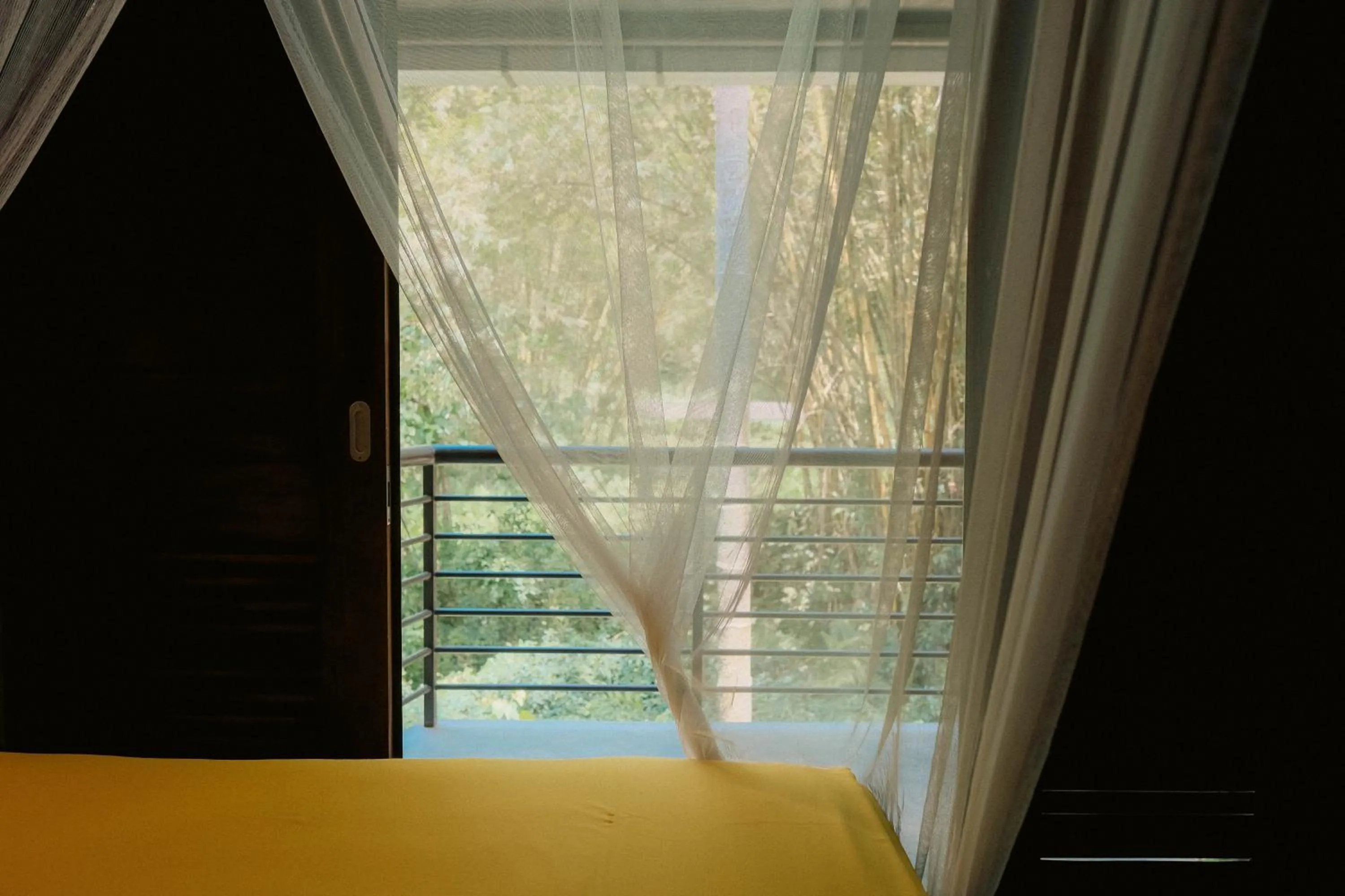 Bed in Ecolodge Bukit Lawang