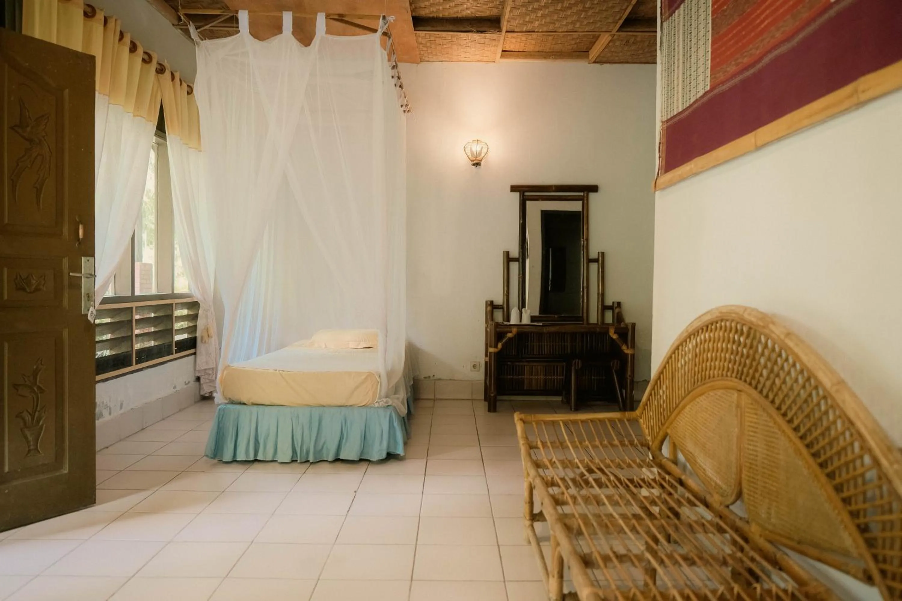 Bed in Ecolodge Bukit Lawang