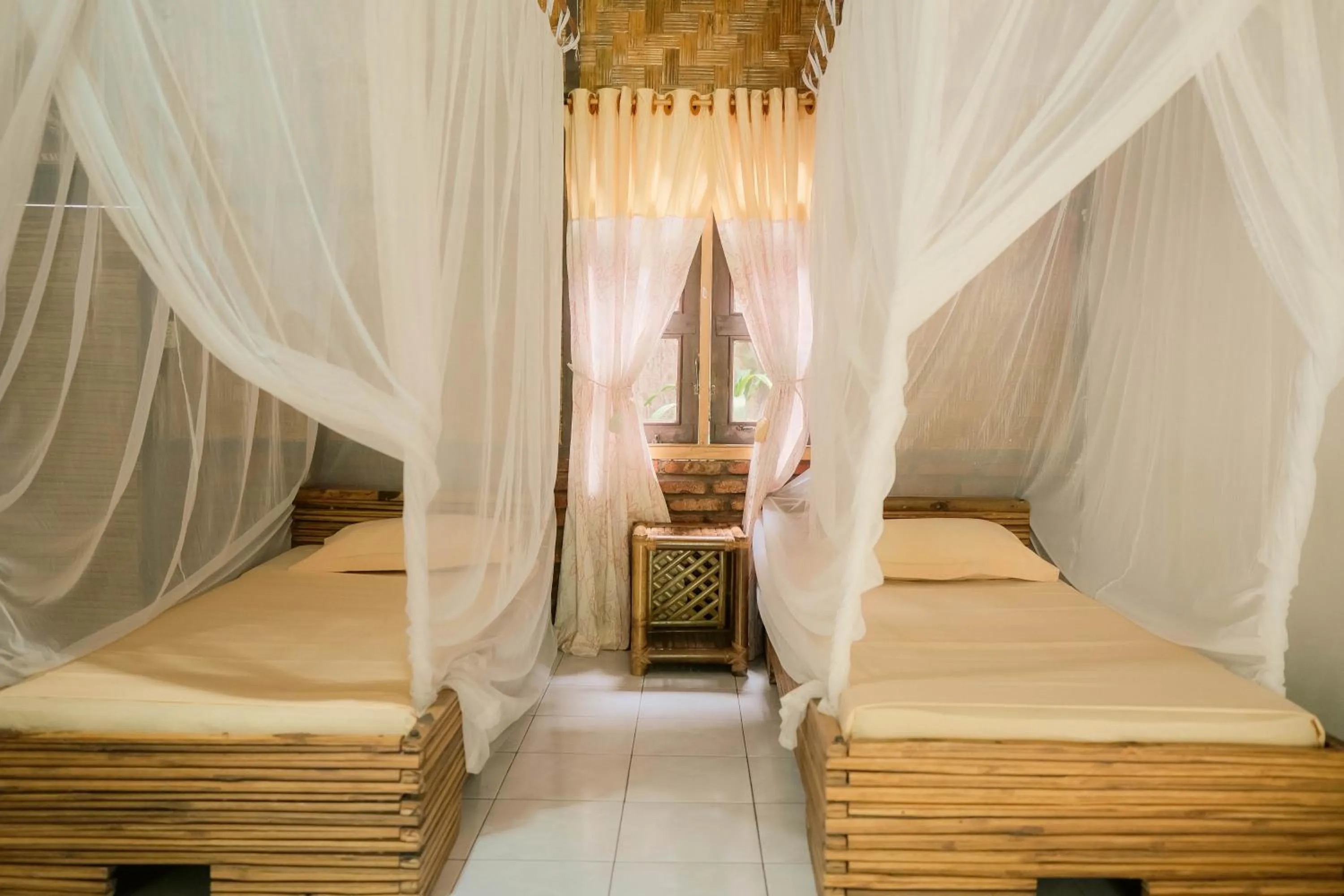 Bed in Ecolodge Bukit Lawang