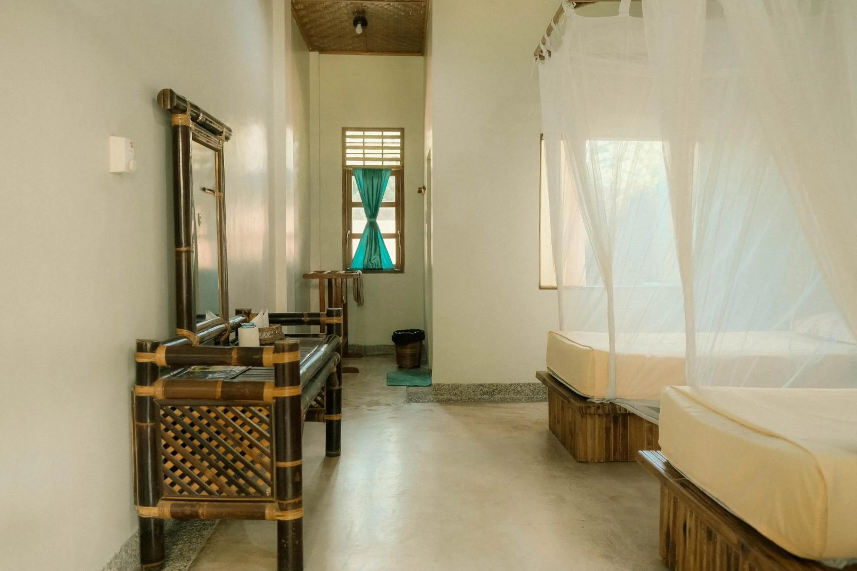 Bed in Ecolodge Bukit Lawang