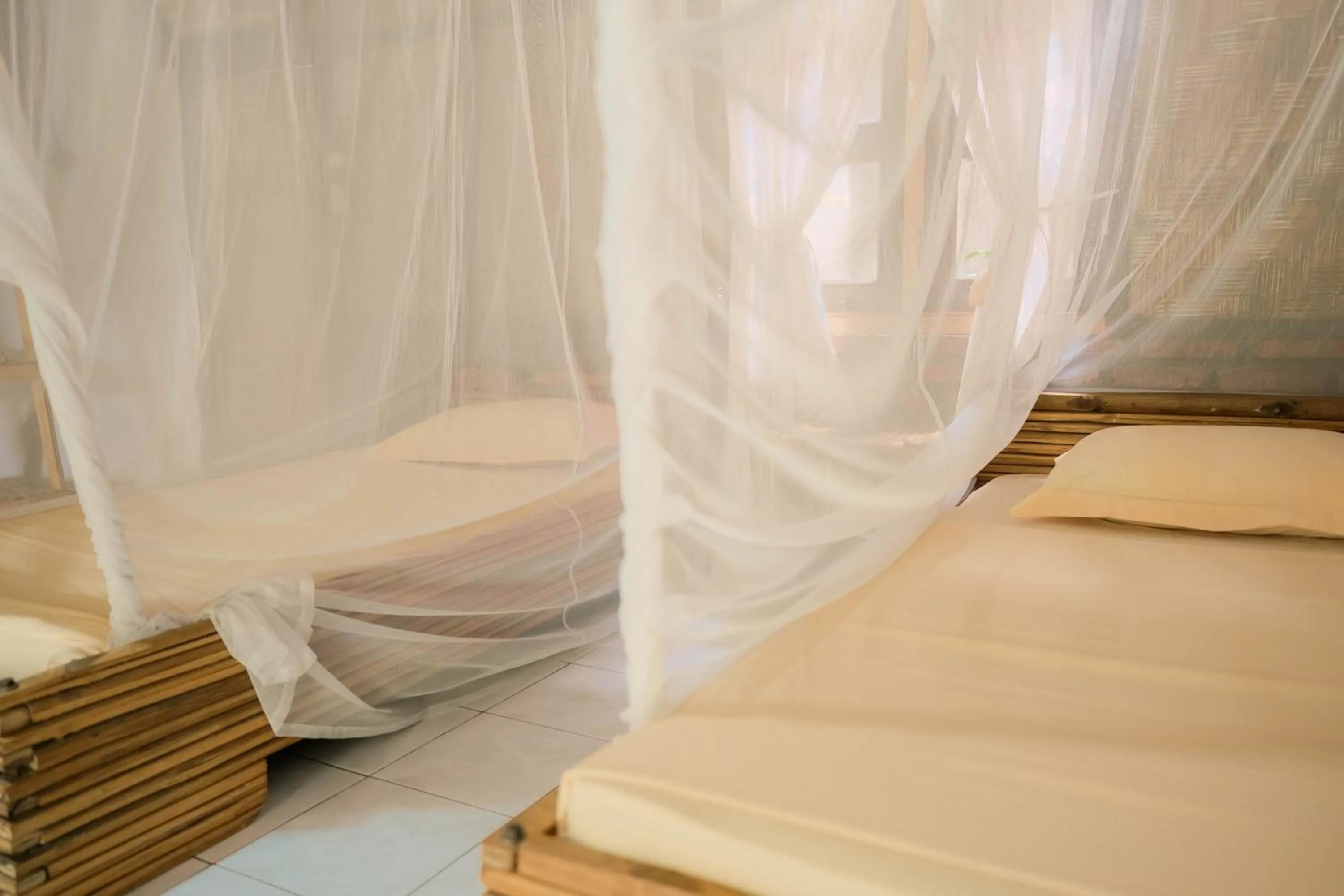 Bed in Ecolodge Bukit Lawang