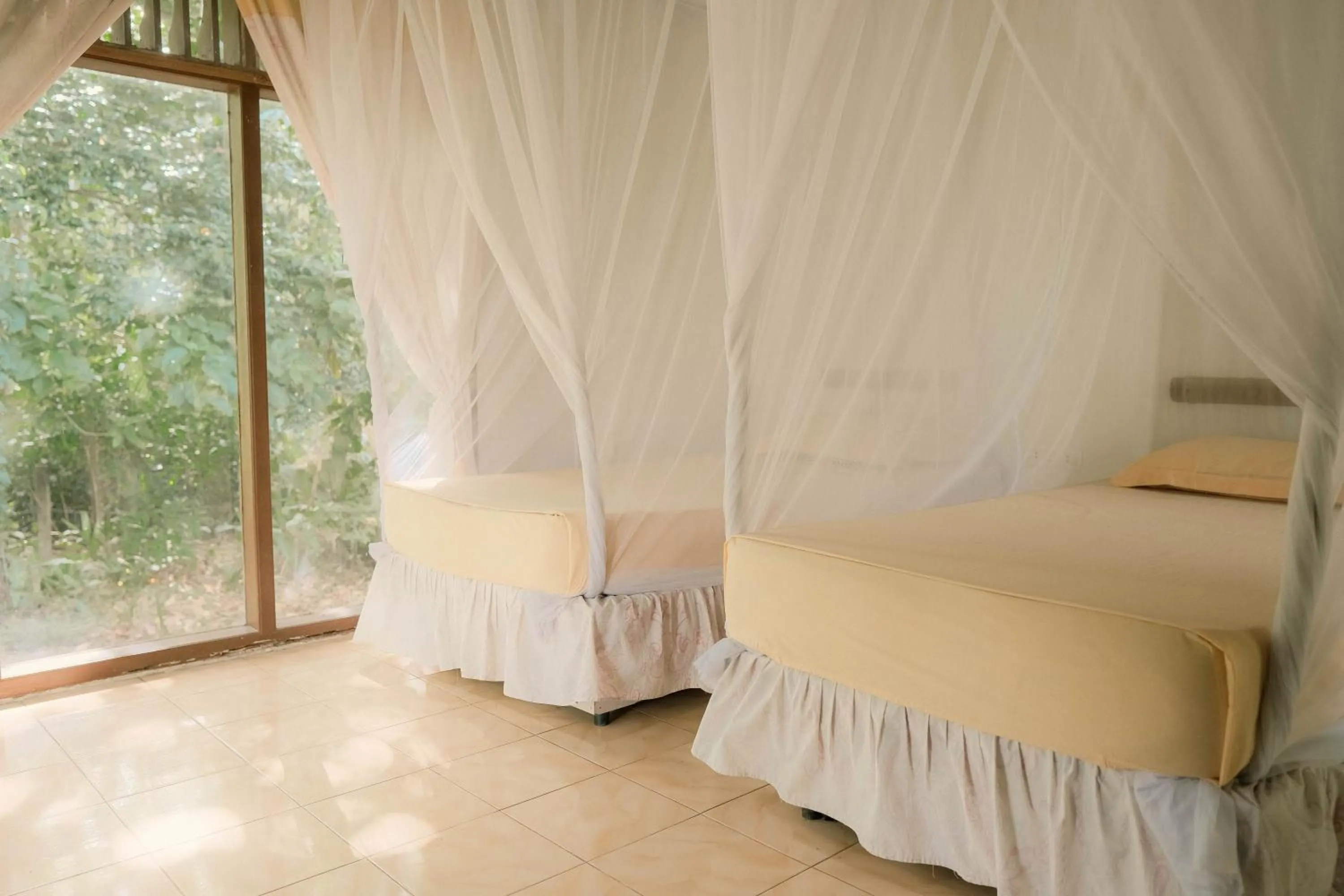 Bed in Ecolodge Bukit Lawang