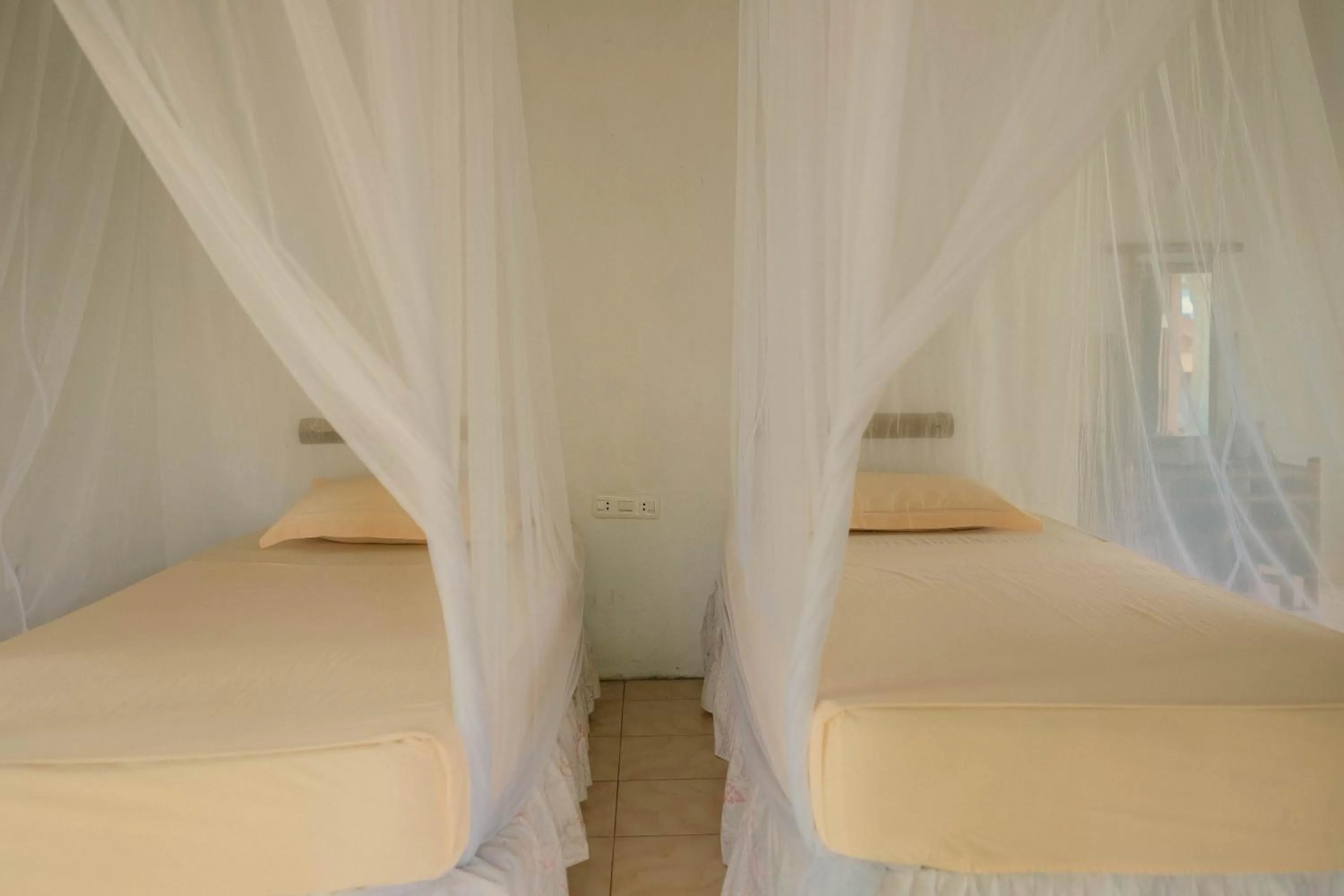 Bed in Ecolodge Bukit Lawang