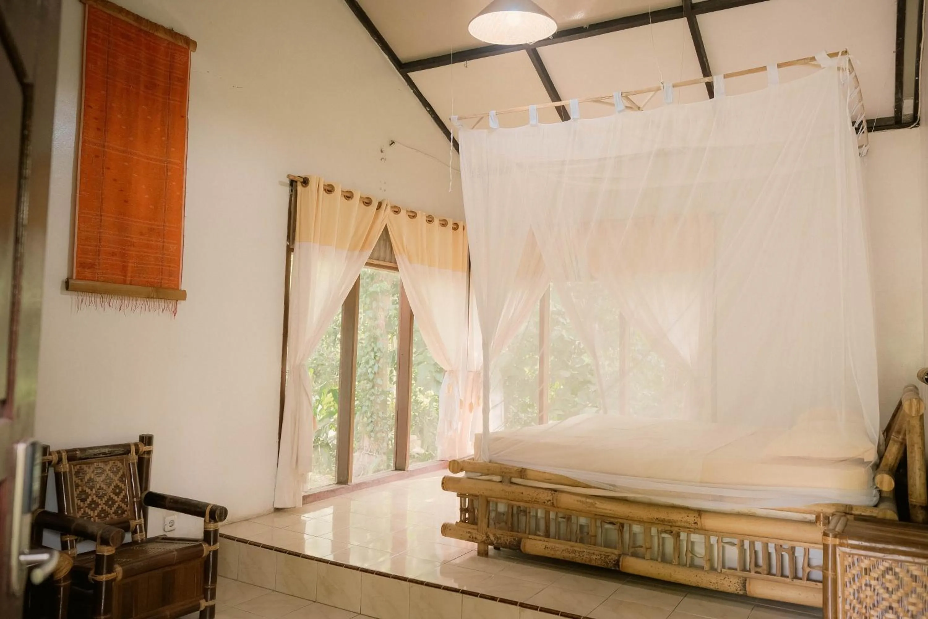 Bed in Ecolodge Bukit Lawang