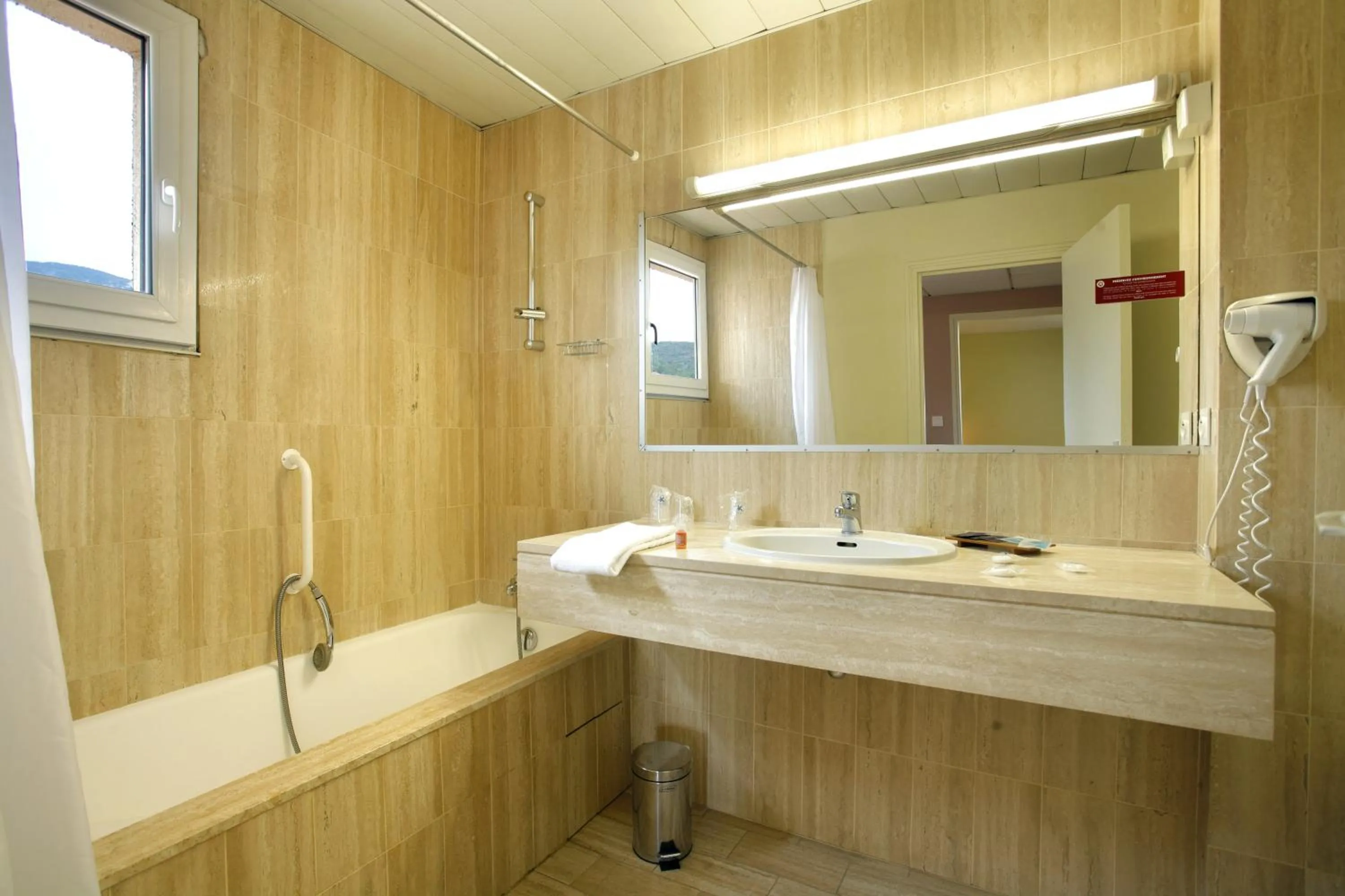 Bathroom in Logis Hôtel Cartier