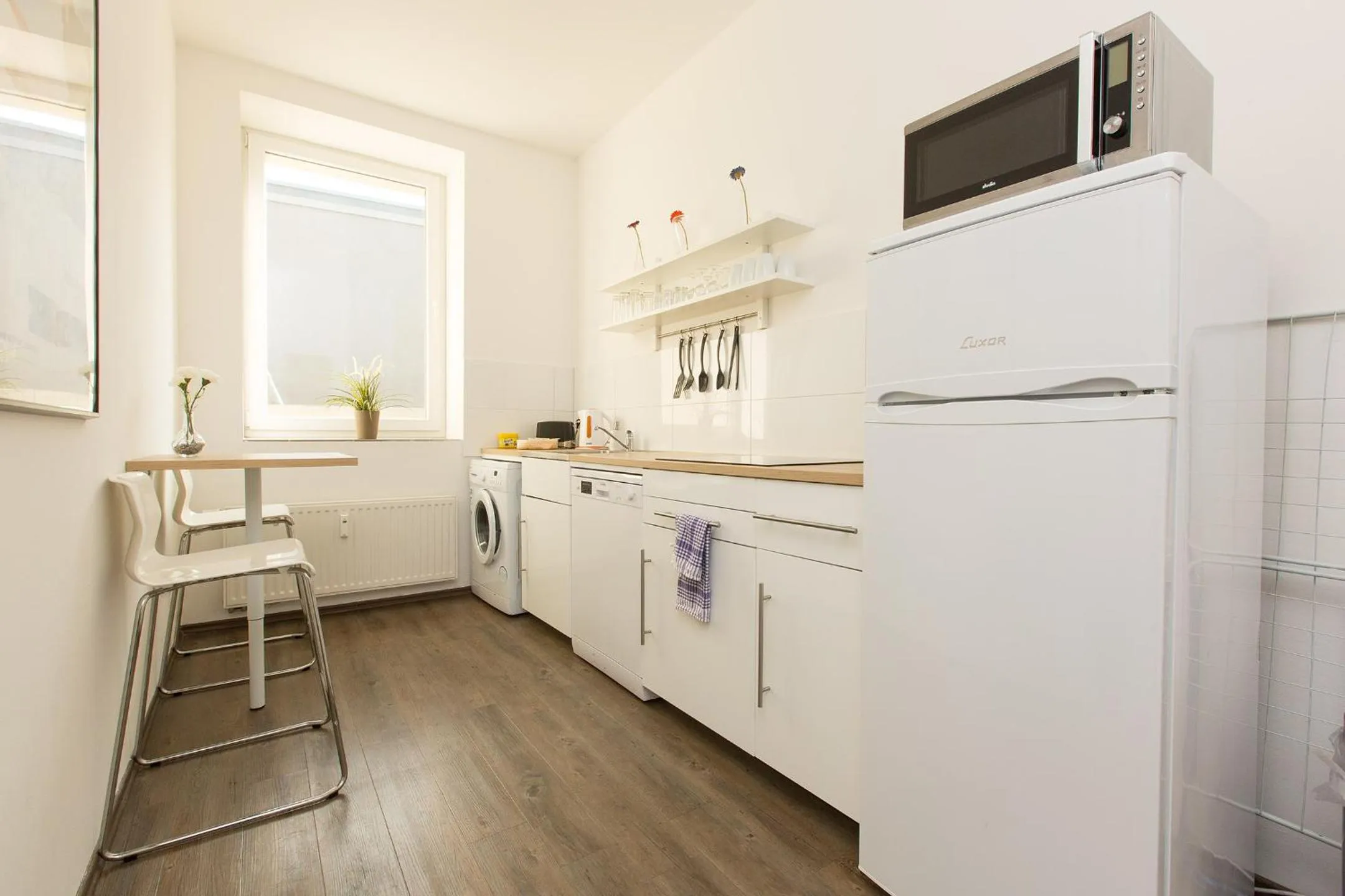 Kitchen or kitchenette in T3 Cityloft Appartments