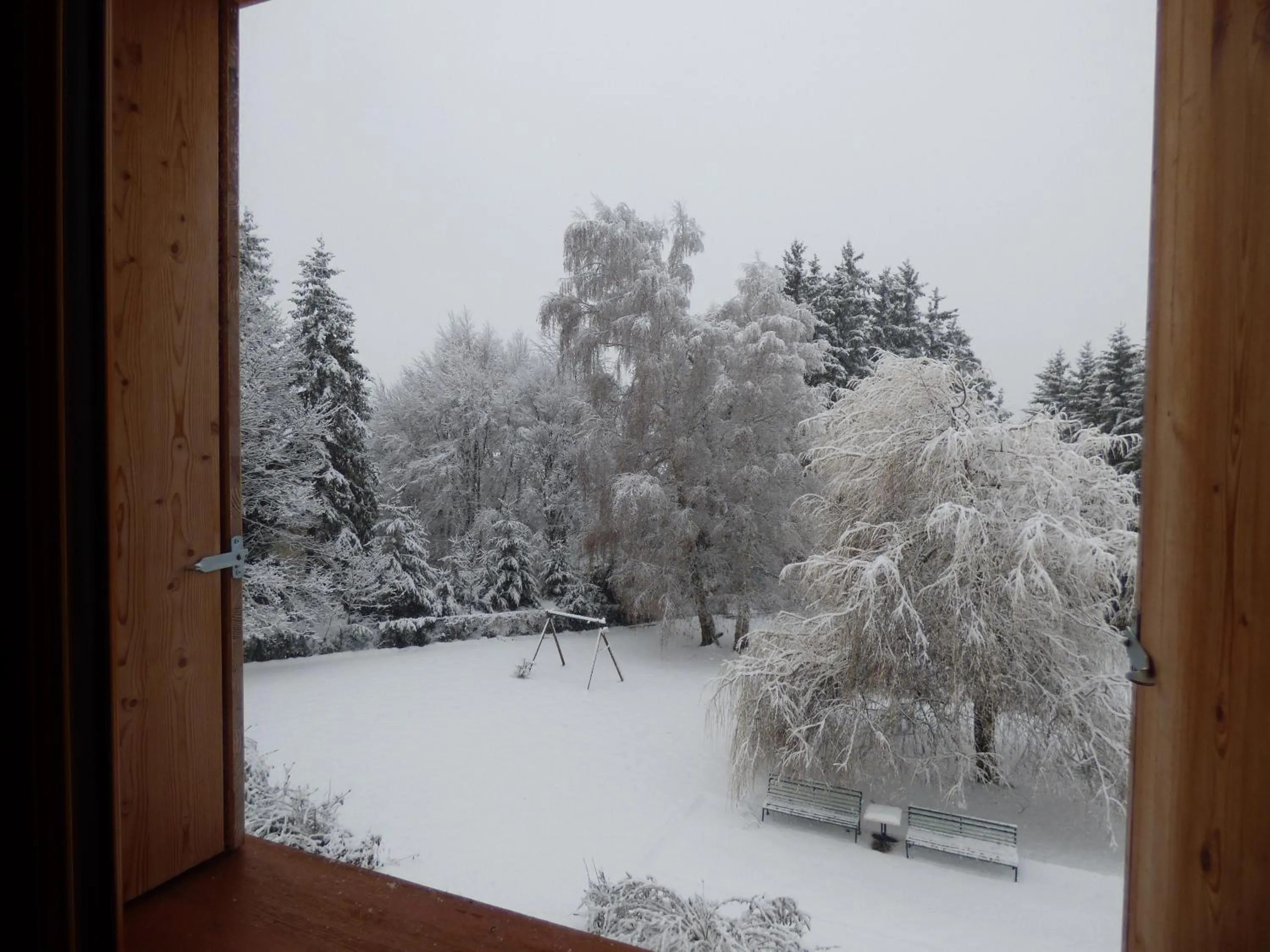 Garden view in Logis Hôtels La Crémaillère