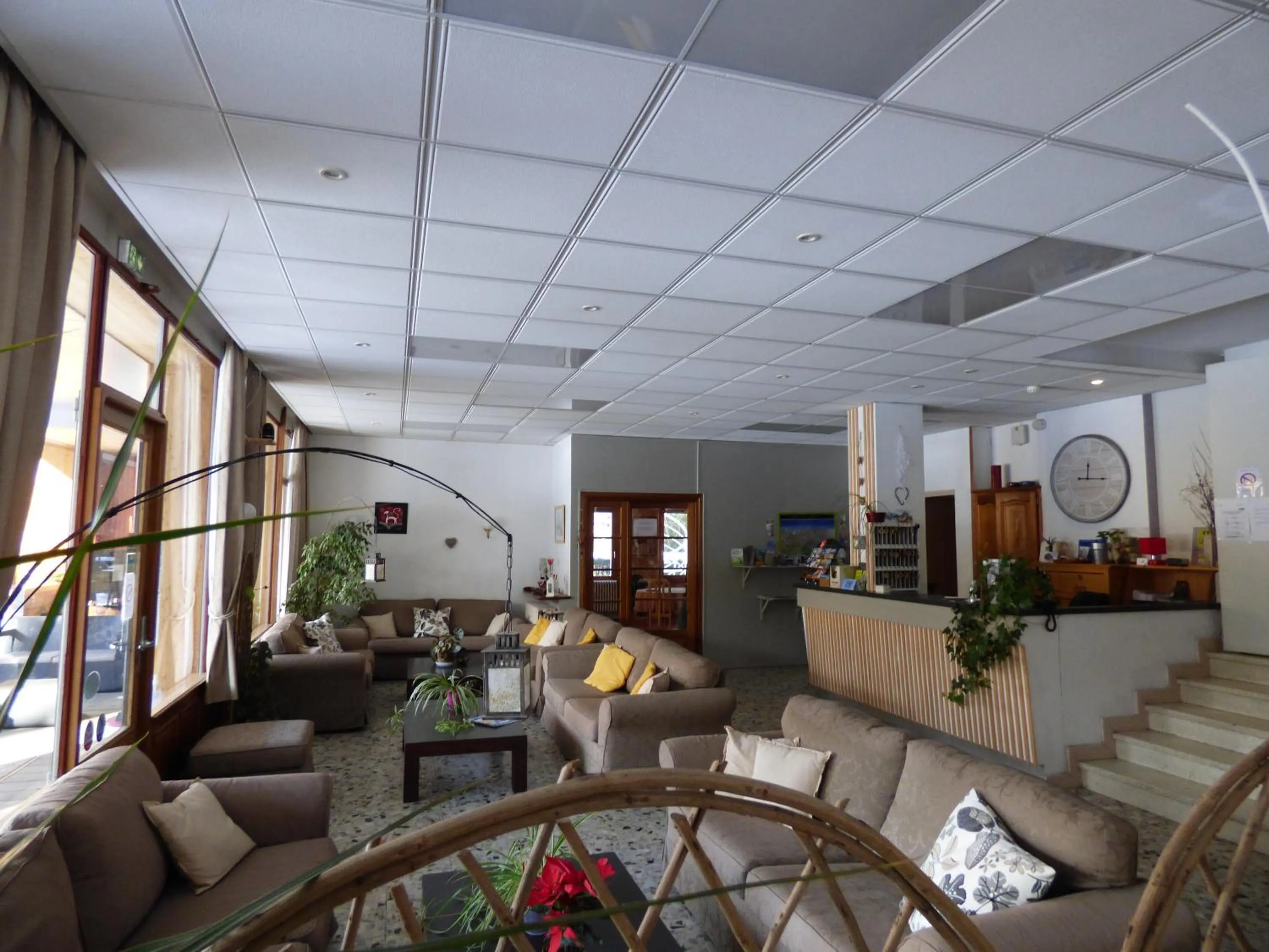 Living room in Logis Hôtels La Crémaillère