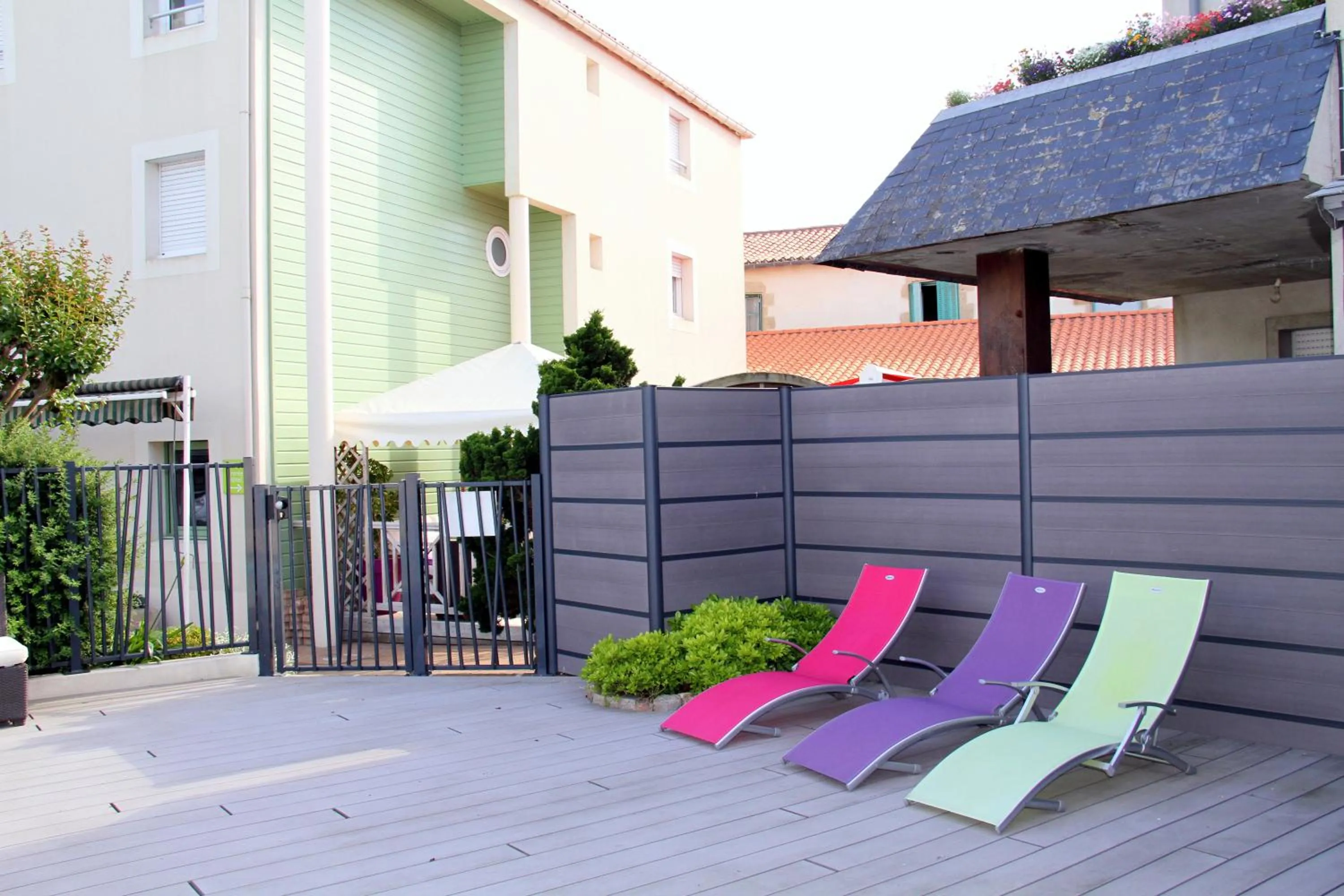 Swimming pool in Logis Hotel Restaurant Le Grand Turc