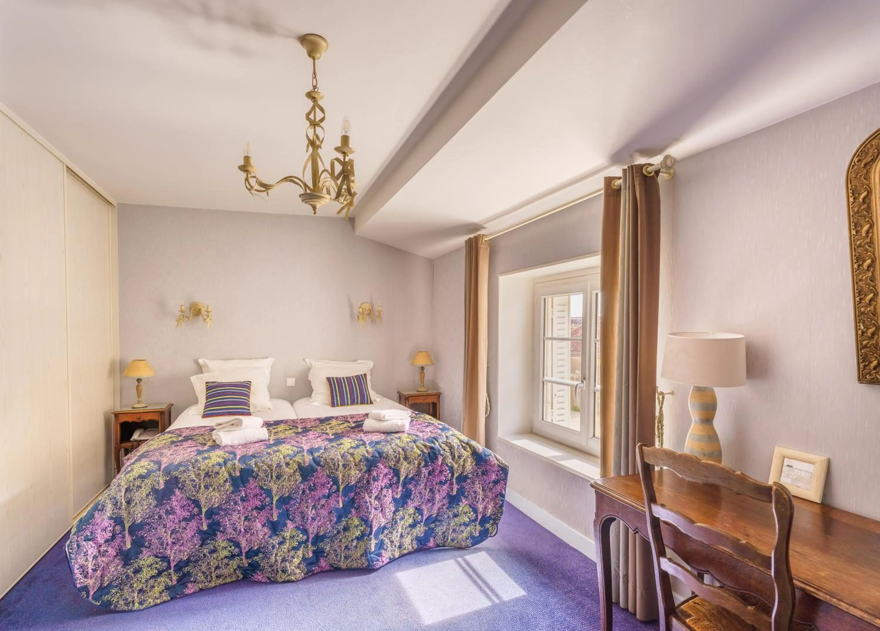 Bed in Hôtel Le Clos des Arts