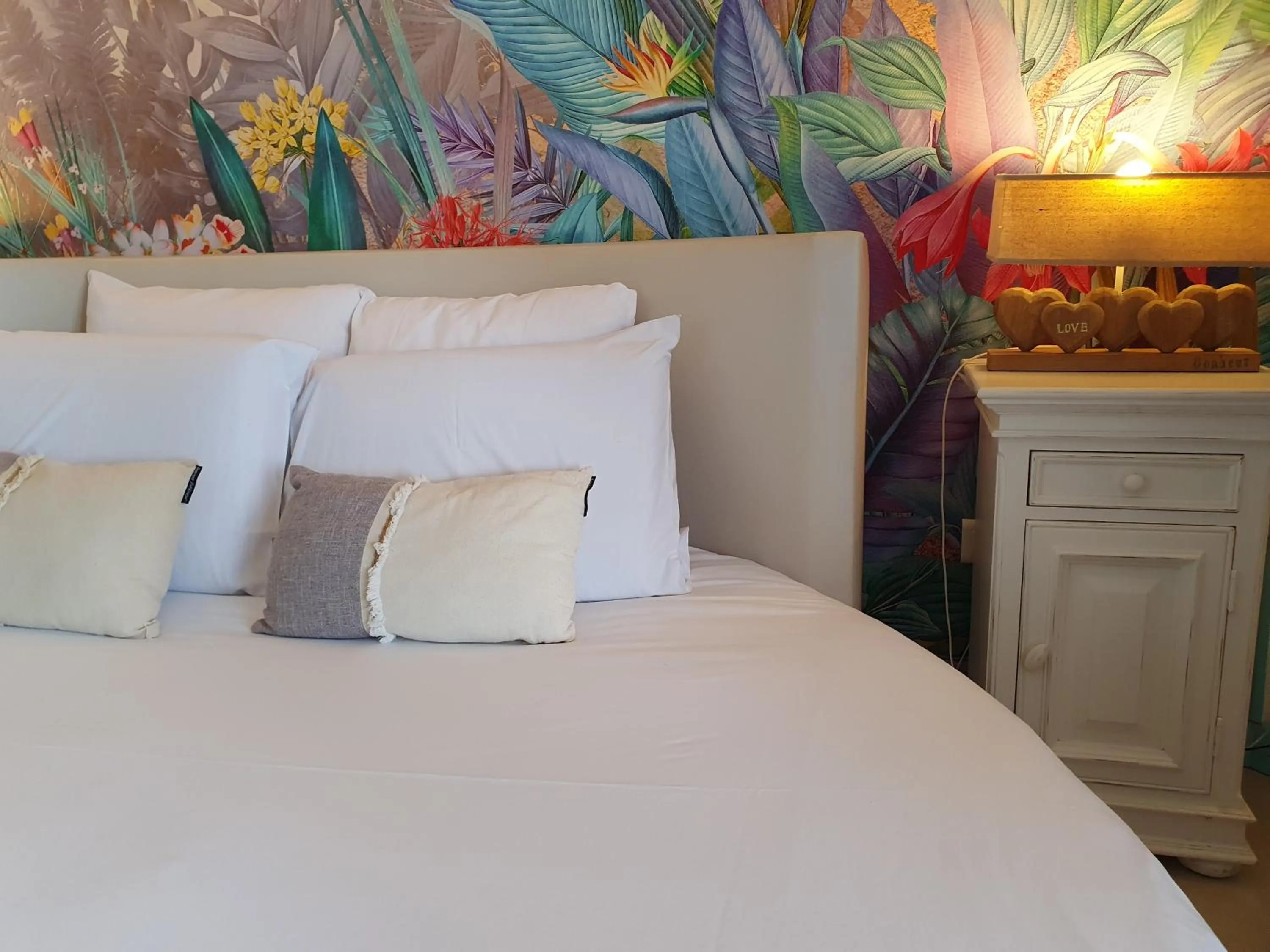 Bed in Le Belvédère Hotel et Bien être