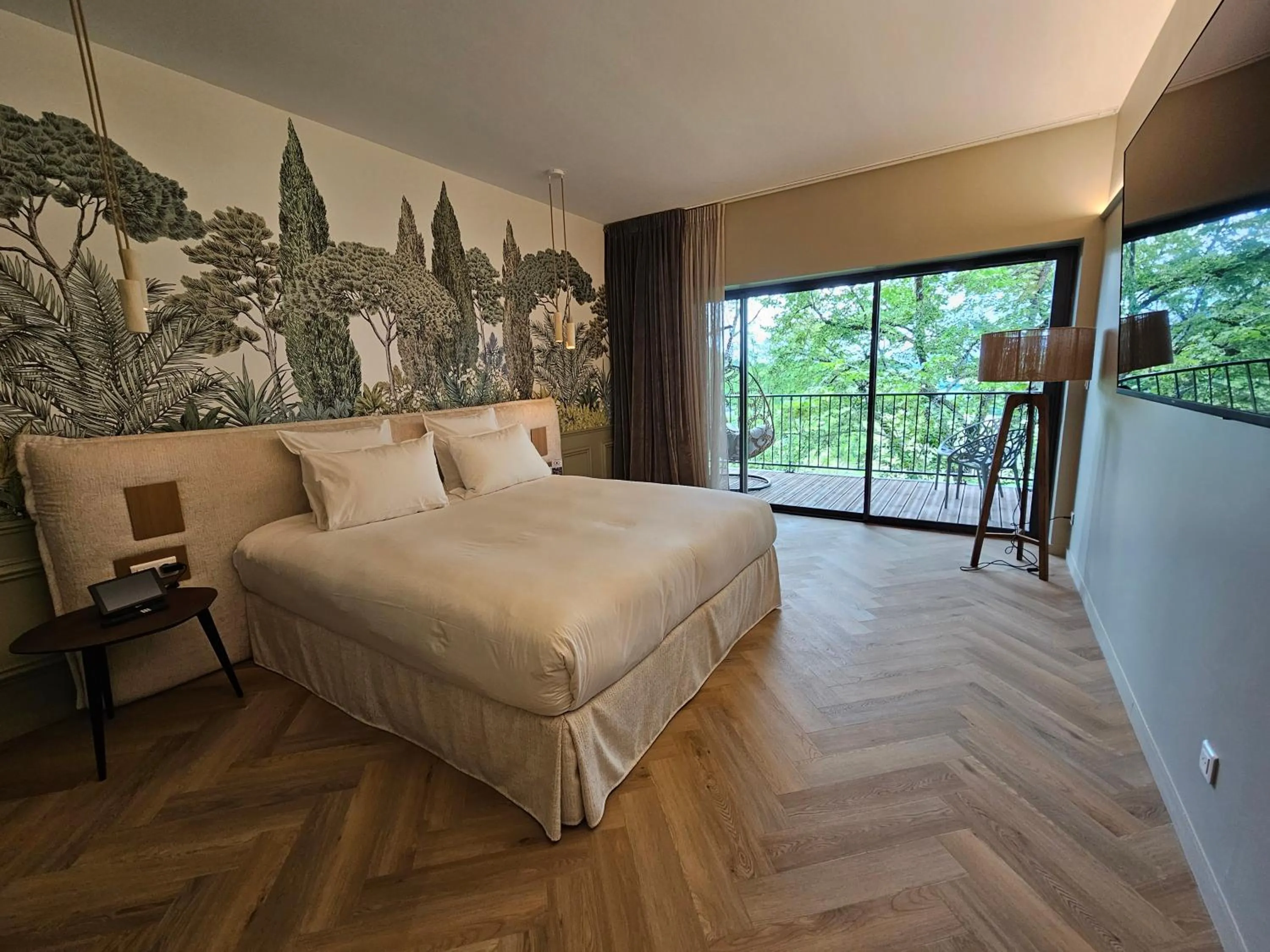 Bed in Le Belvédère Hotel et Bien être