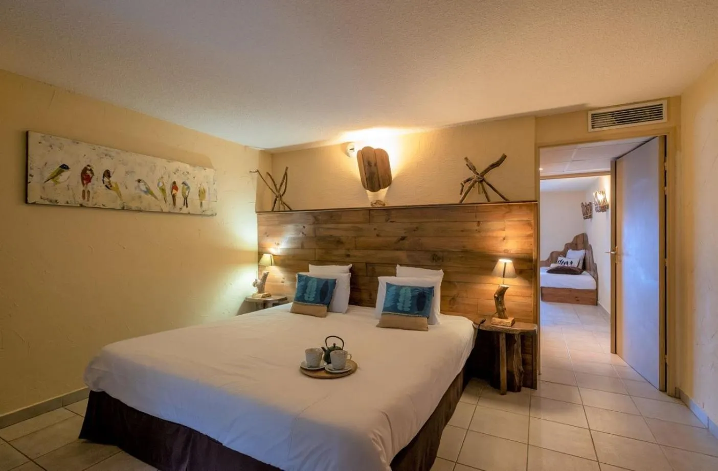 Bed in Le Belvédère Hotel et Bien être