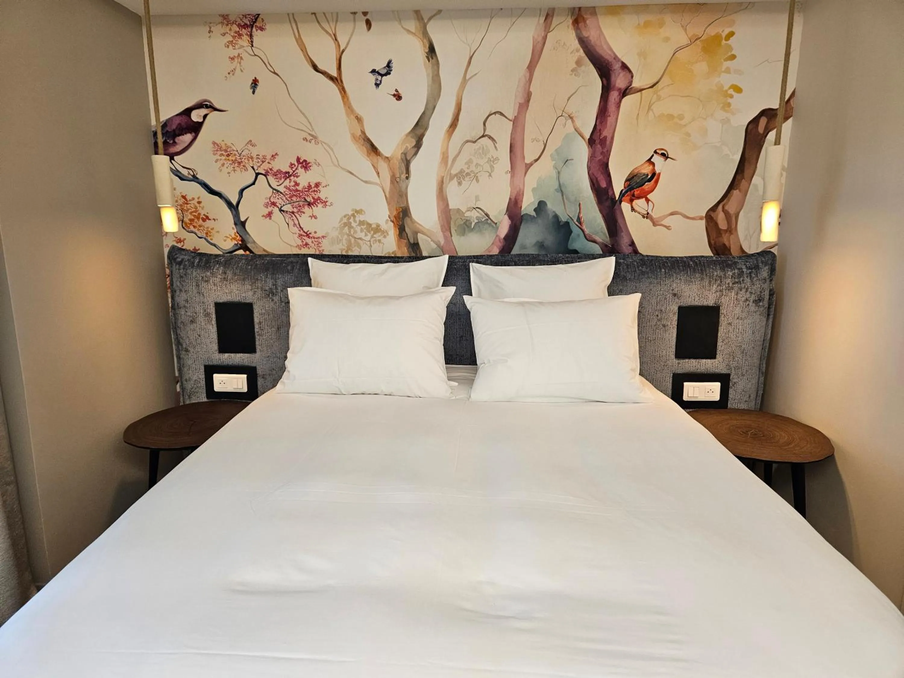 Bed in Le Belvédère Hotel et Bien être