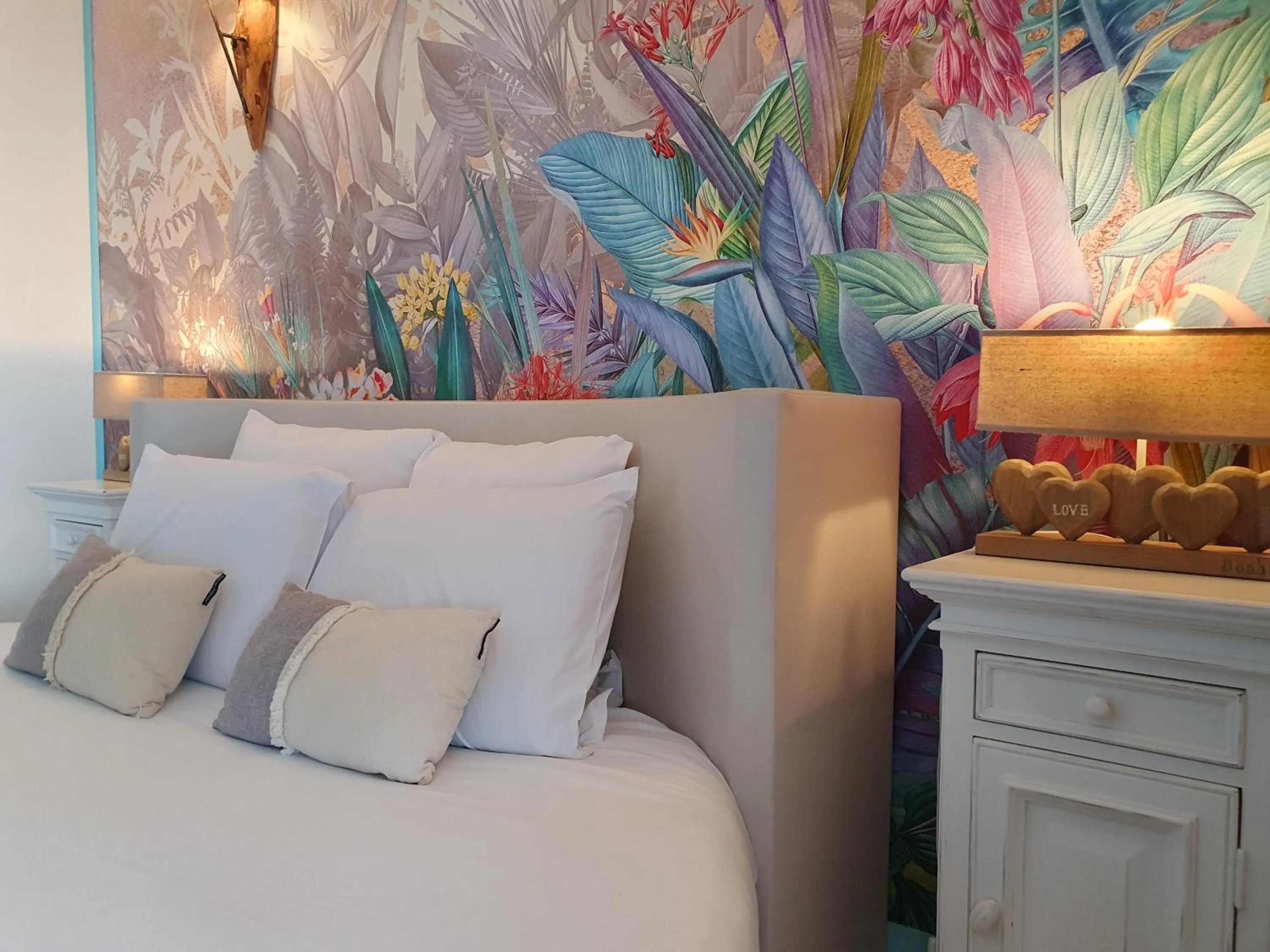 Bed in Le Belvédère Hotel et Bien être