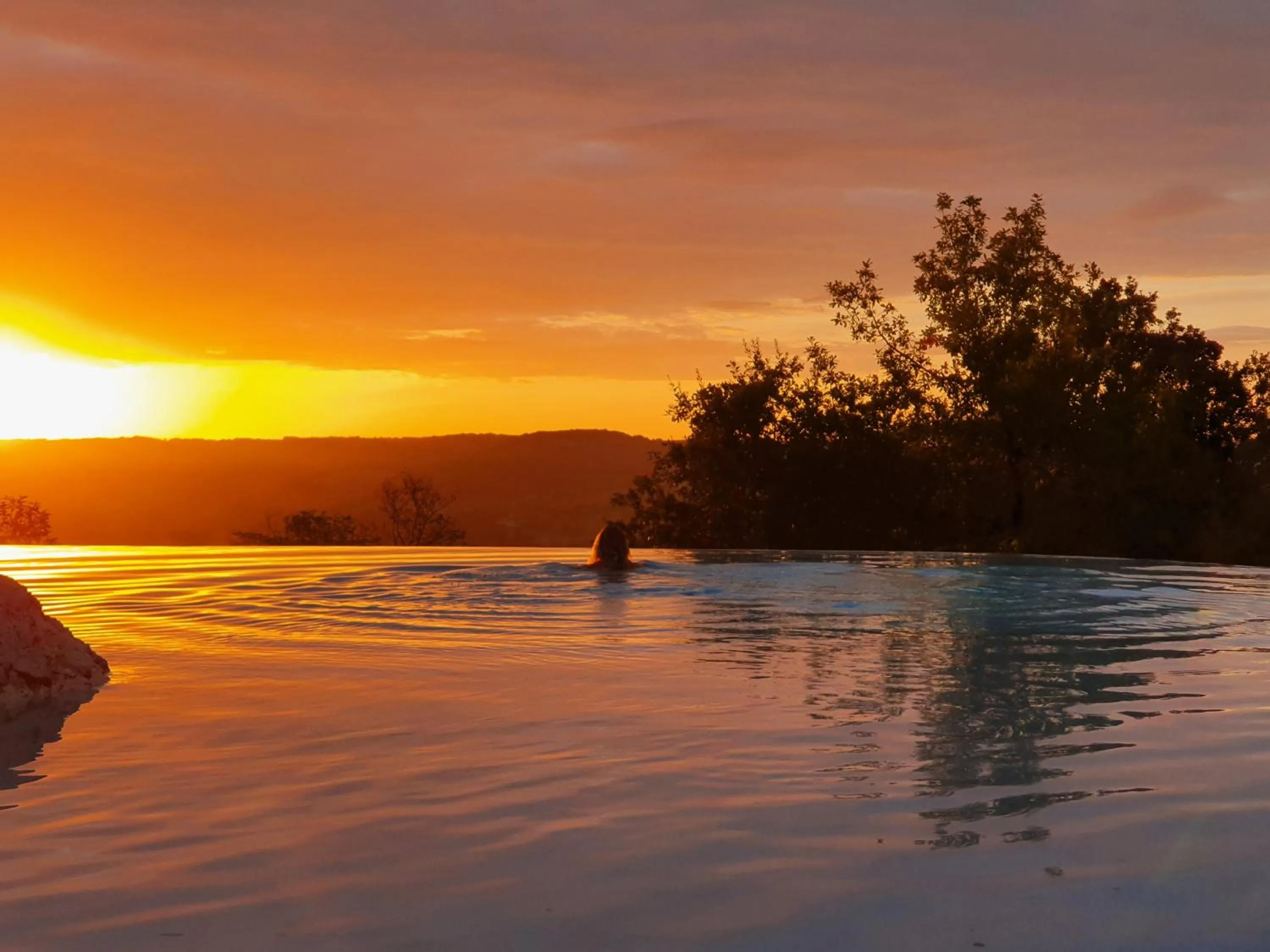 Swimming pool in Le Belvédère Hotel et Bien être