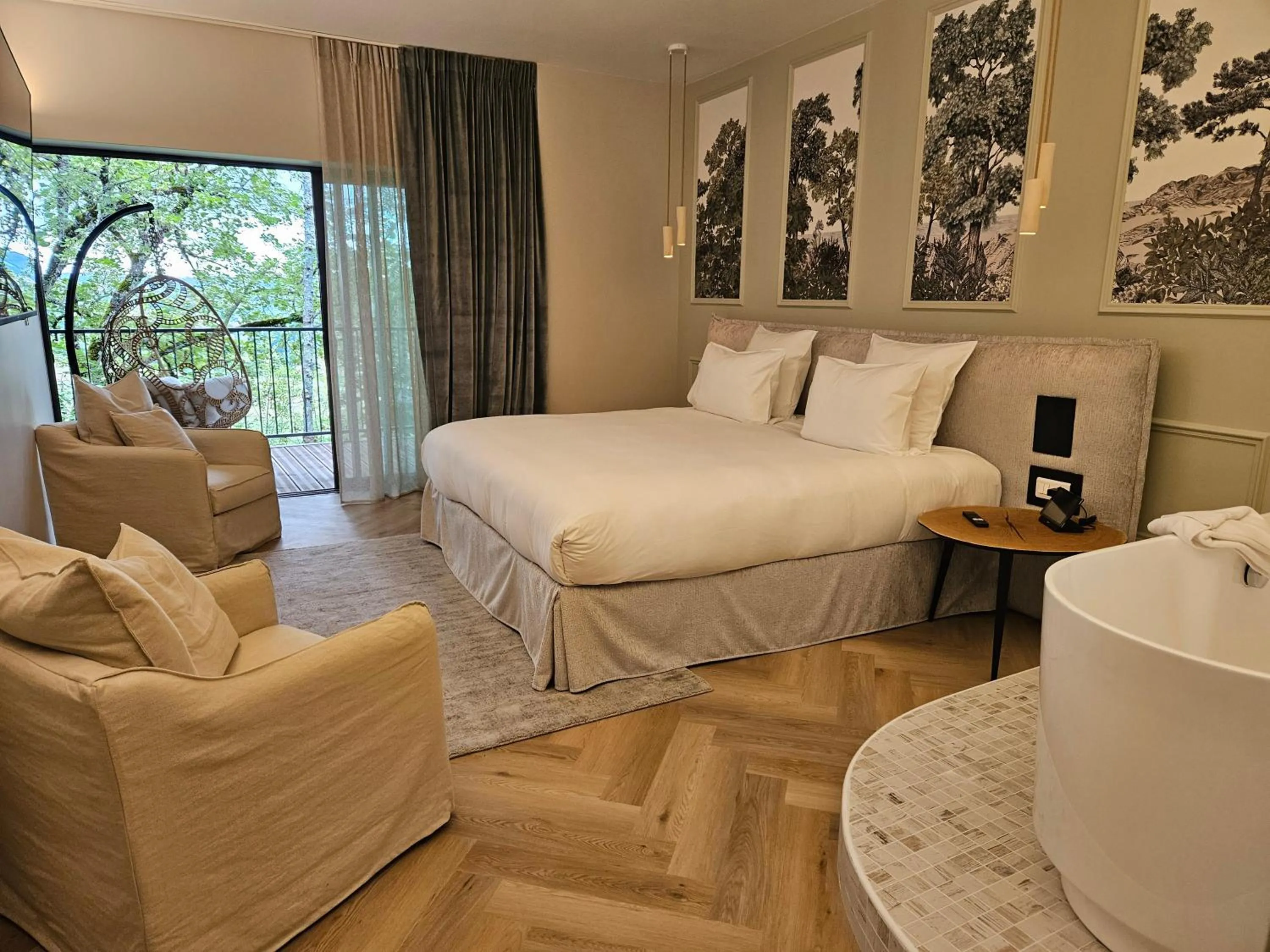 Bed in Le Belvédère Hotel et Bien être