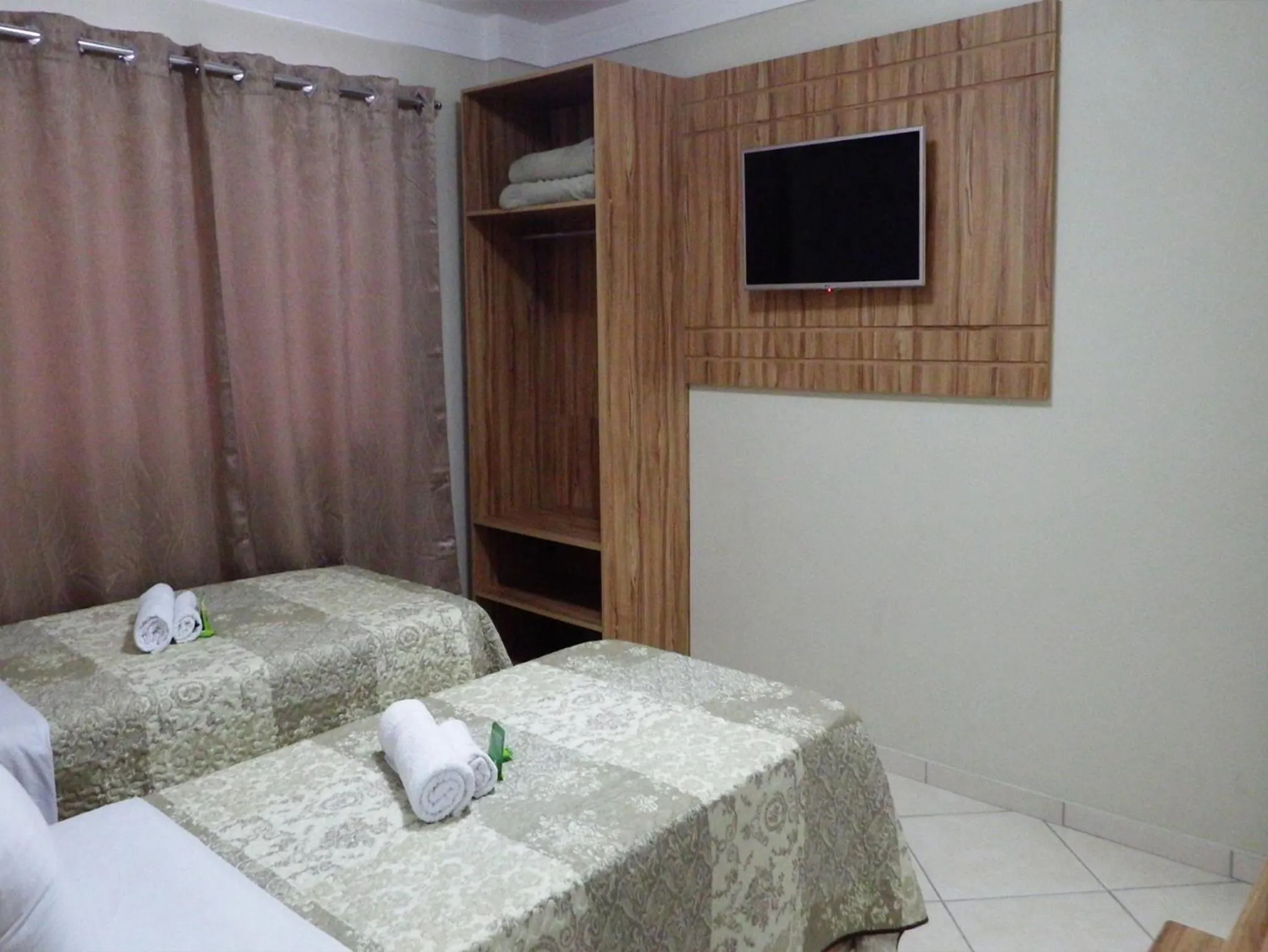 Bed in Coral Palace Hotel