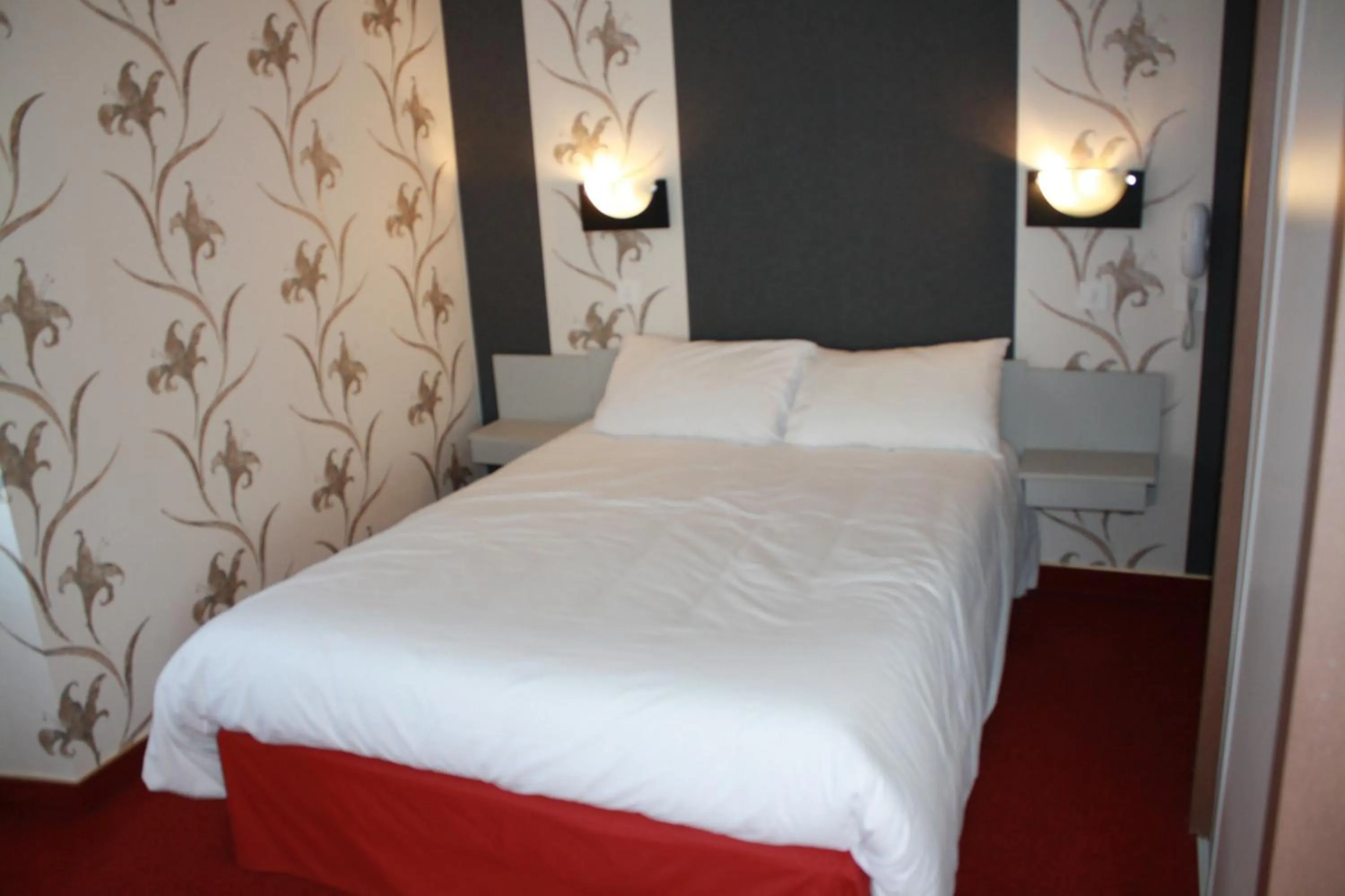 Bed in Hotel du Touring