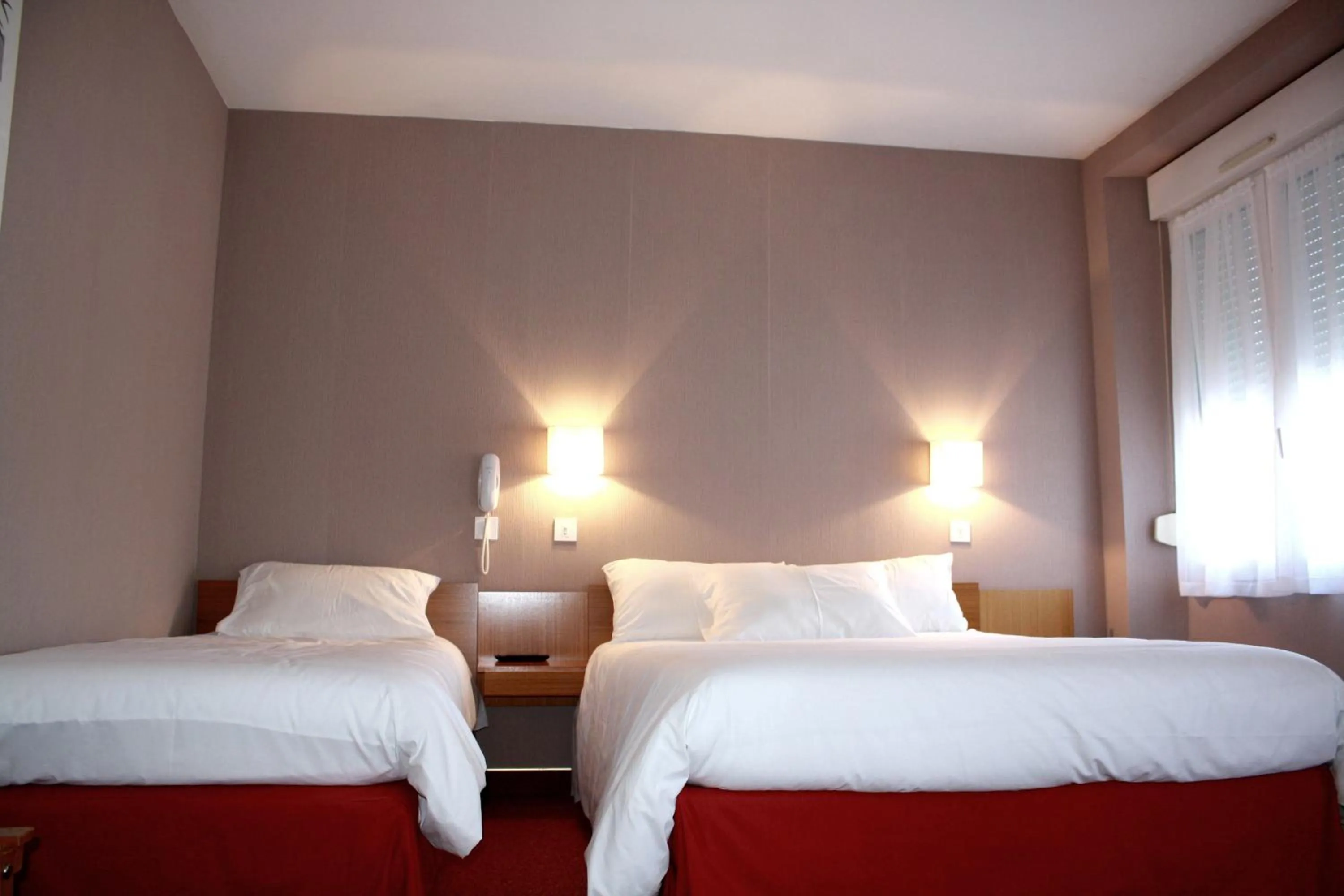 Bed in Hotel du Touring