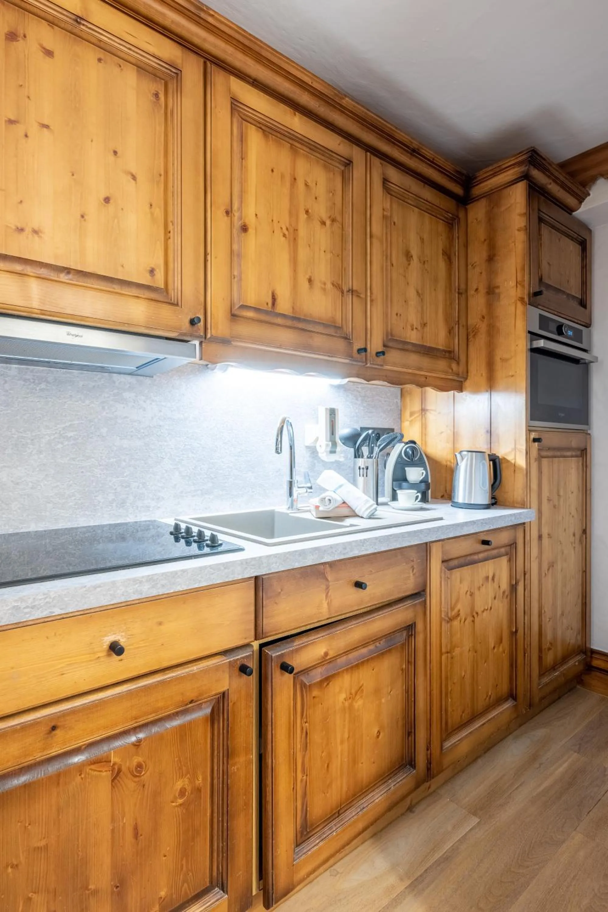 Kitchen or kitchenette in Résidence Pierre & Vacances Premium La Ginabelle