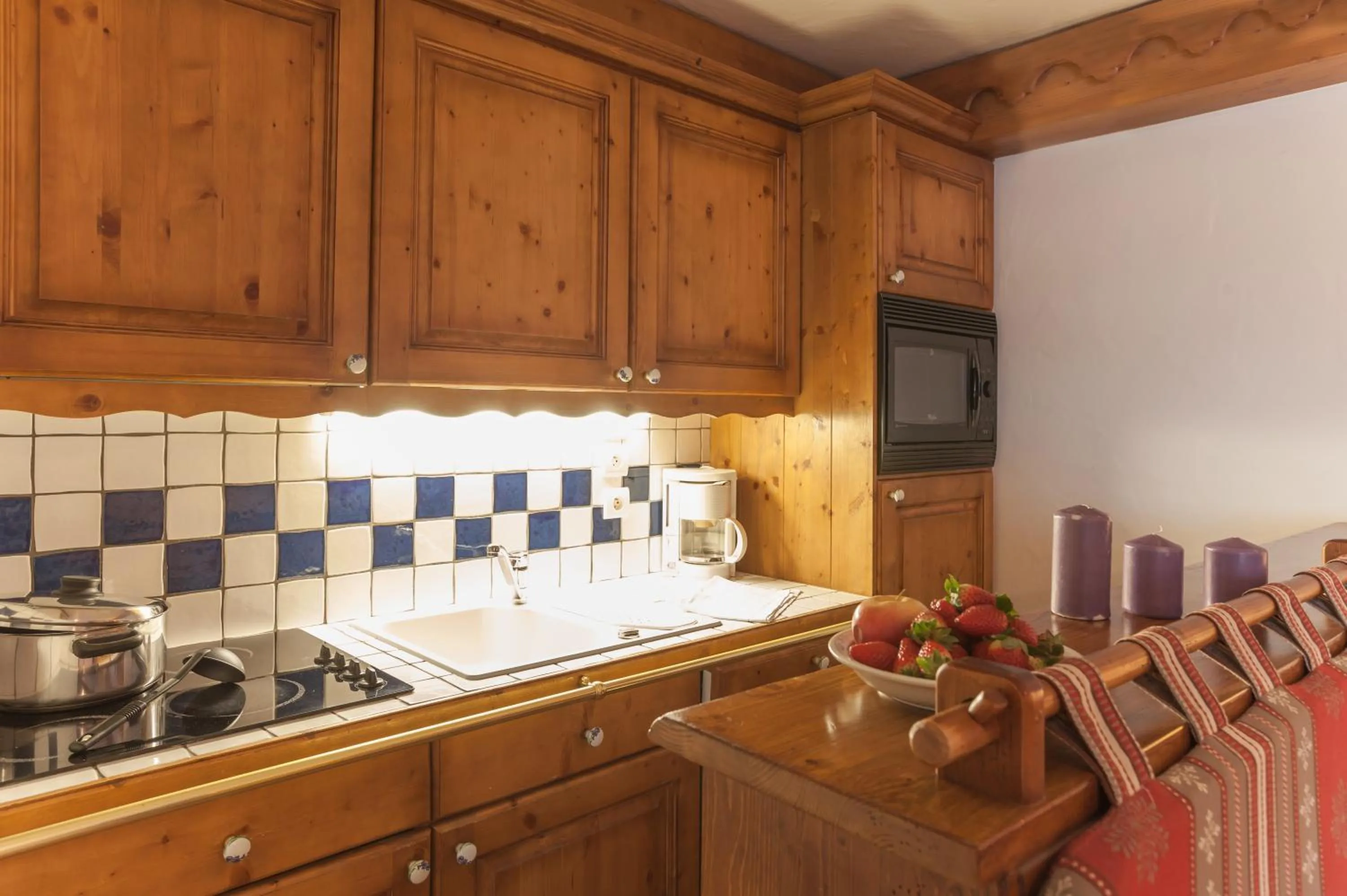 Kitchen or kitchenette in Résidence Pierre & Vacances Premium La Ginabelle