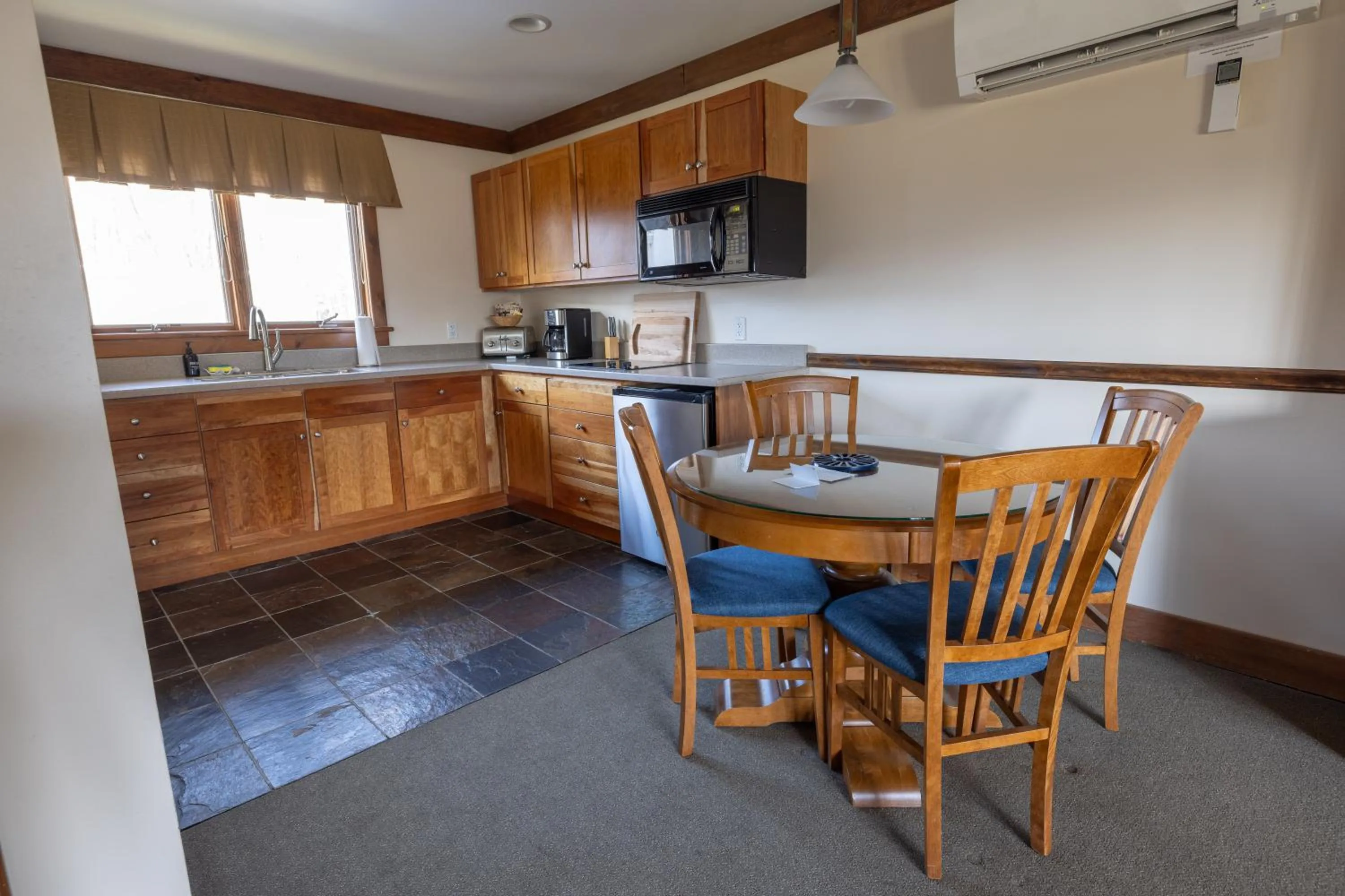 Kitchen or kitchenette in Winwood Condominiums by Windham Mountain Club
