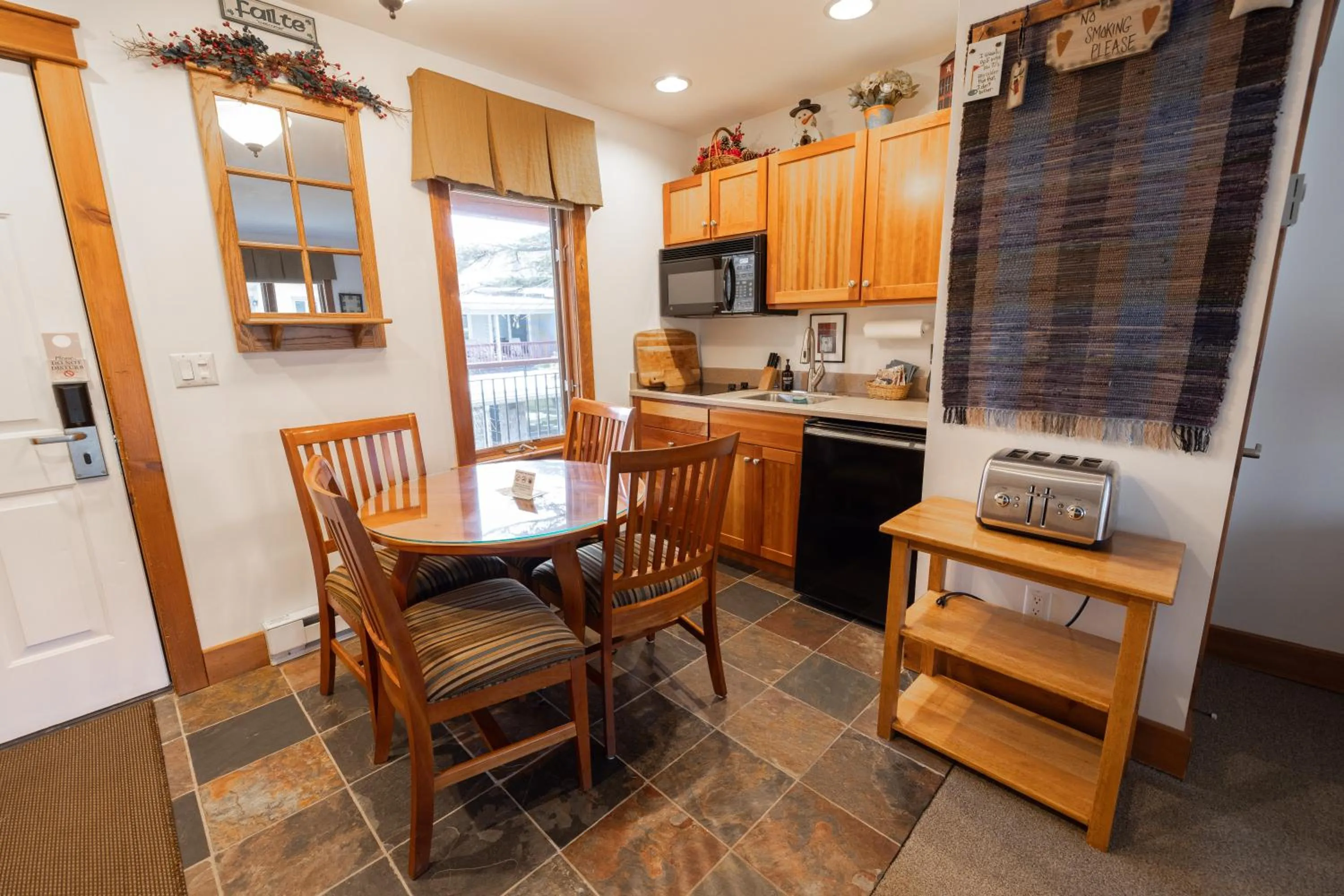 Kitchen or kitchenette in Winwood Condominiums by Windham Mountain Club