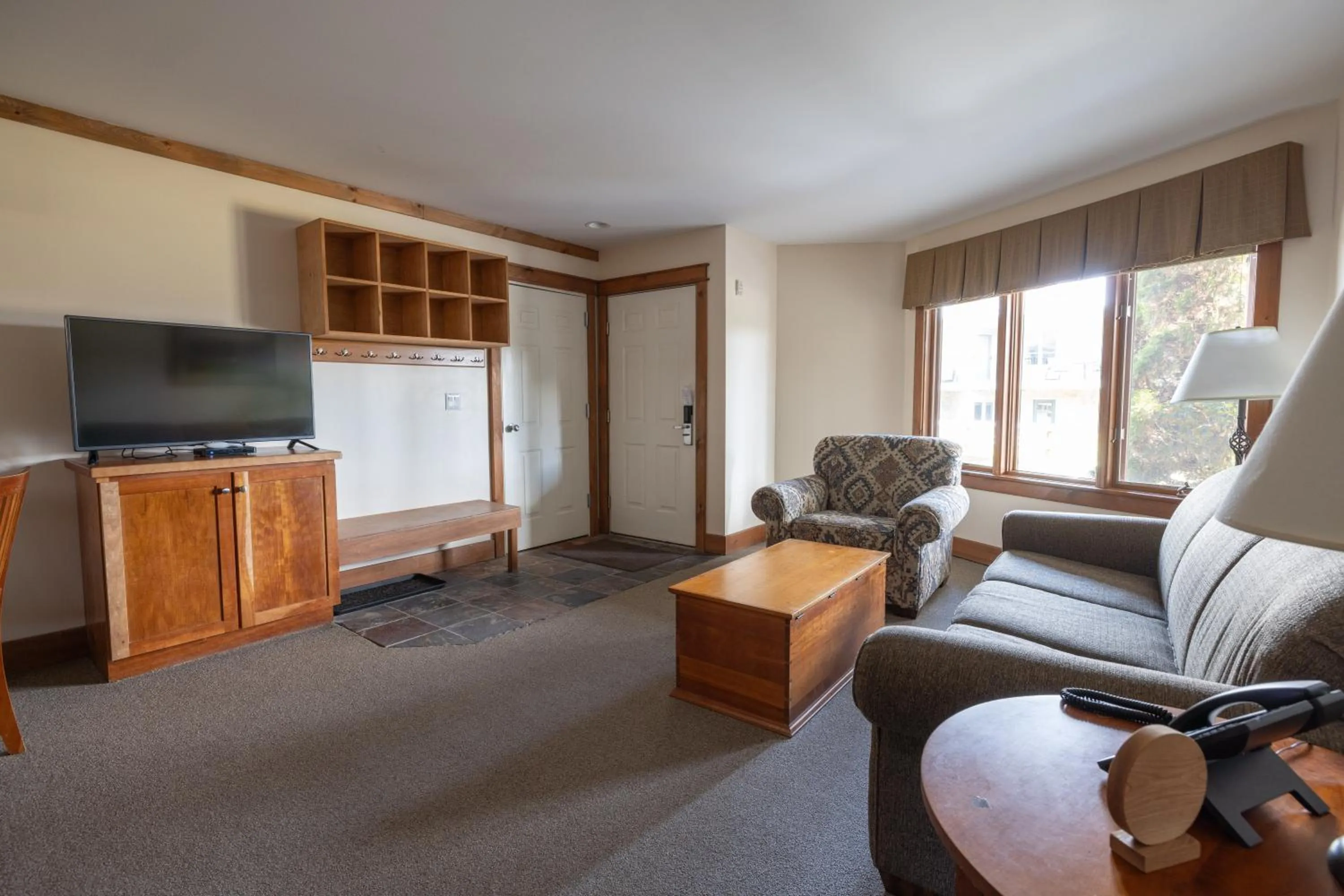 Living room in Winwood Condominiums by Windham Mountain Club