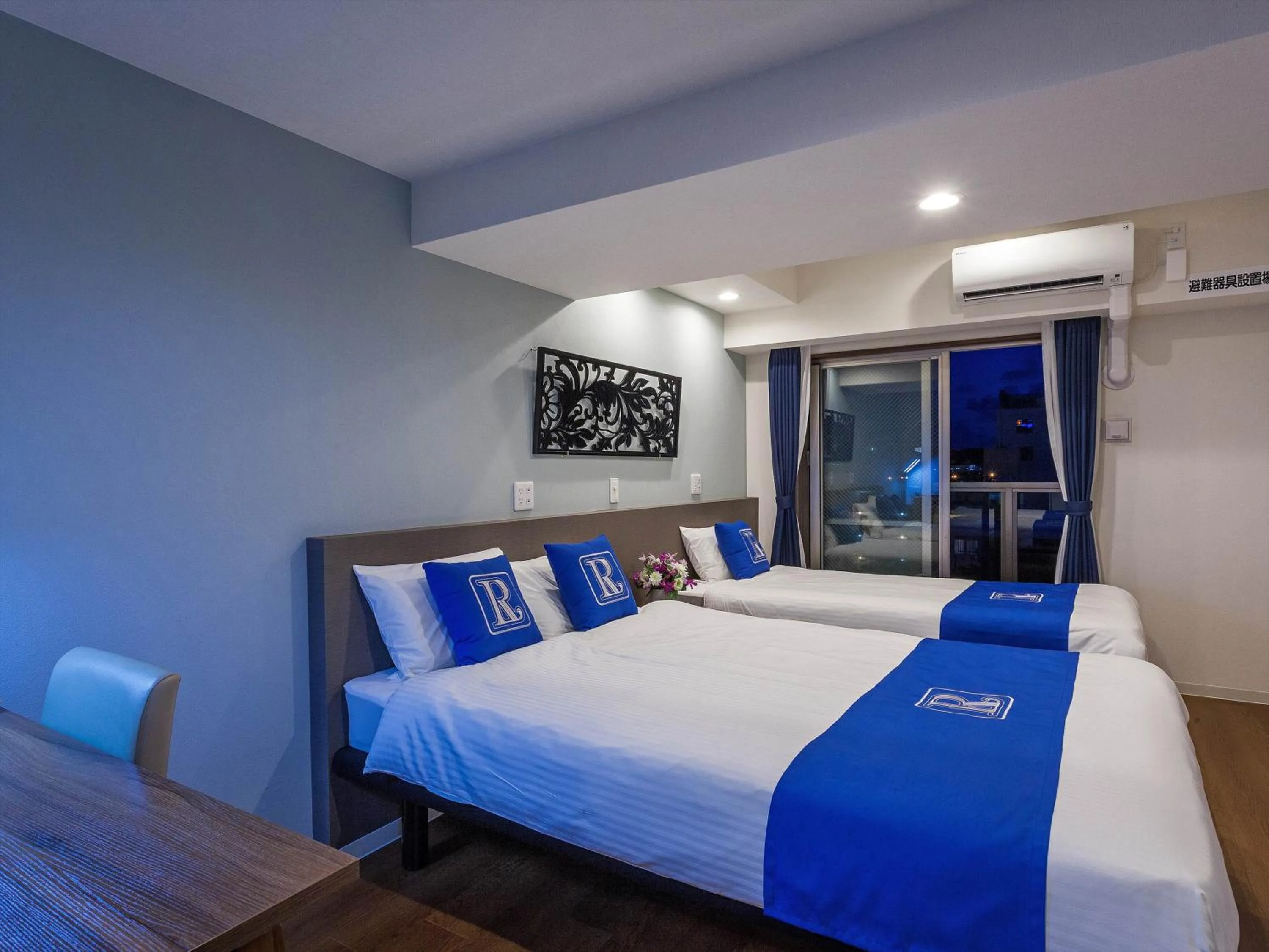 Bed in Living Inn Asahibashiekimae Premier