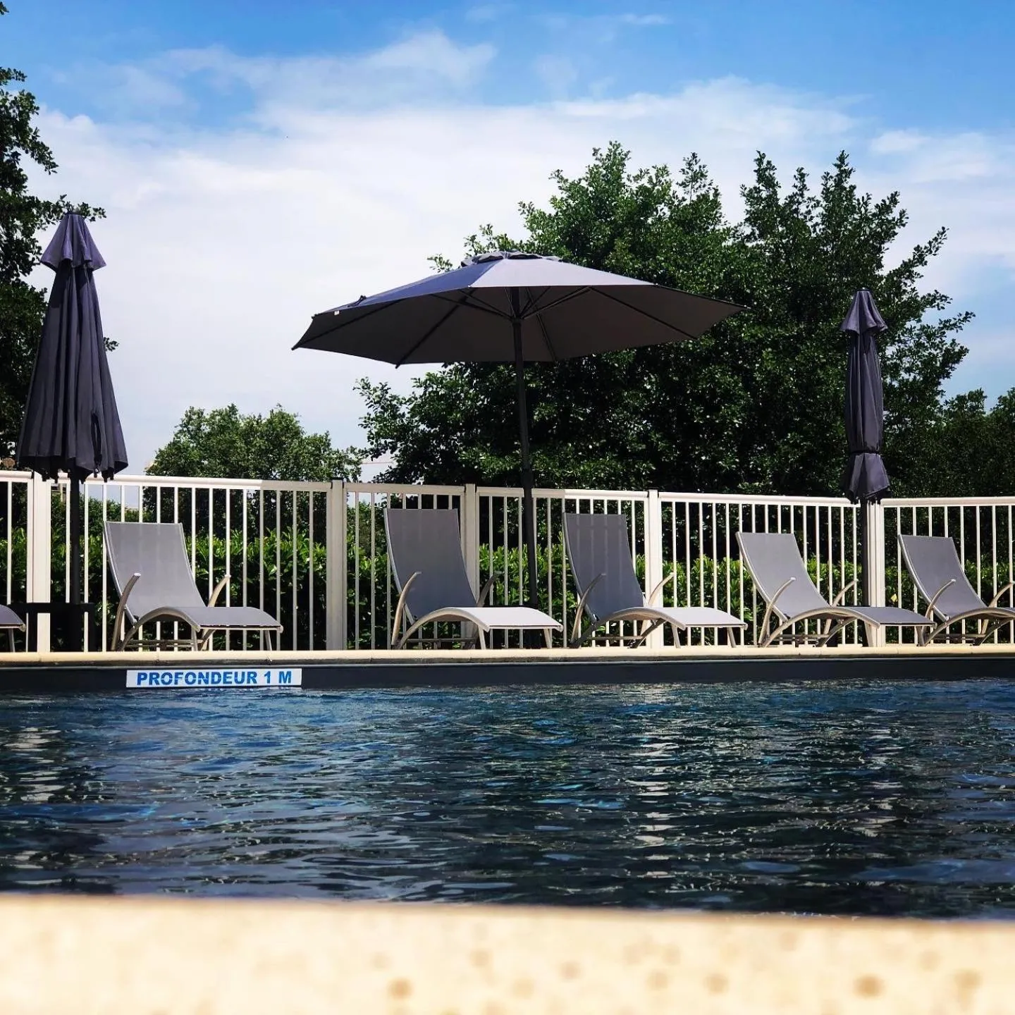 Swimming pool in La Chartreuse Logis Hotel Restaurant