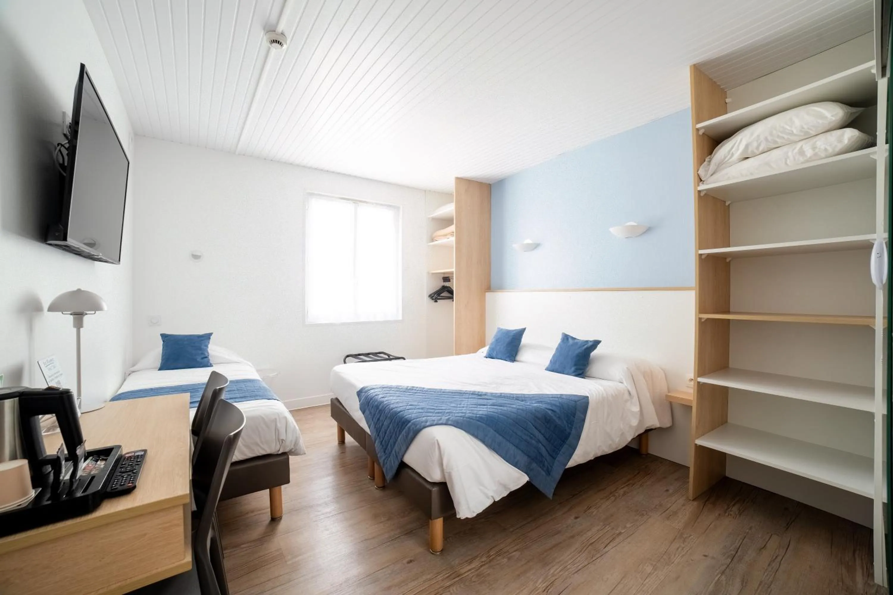 Bed in Hotel Les Dunes