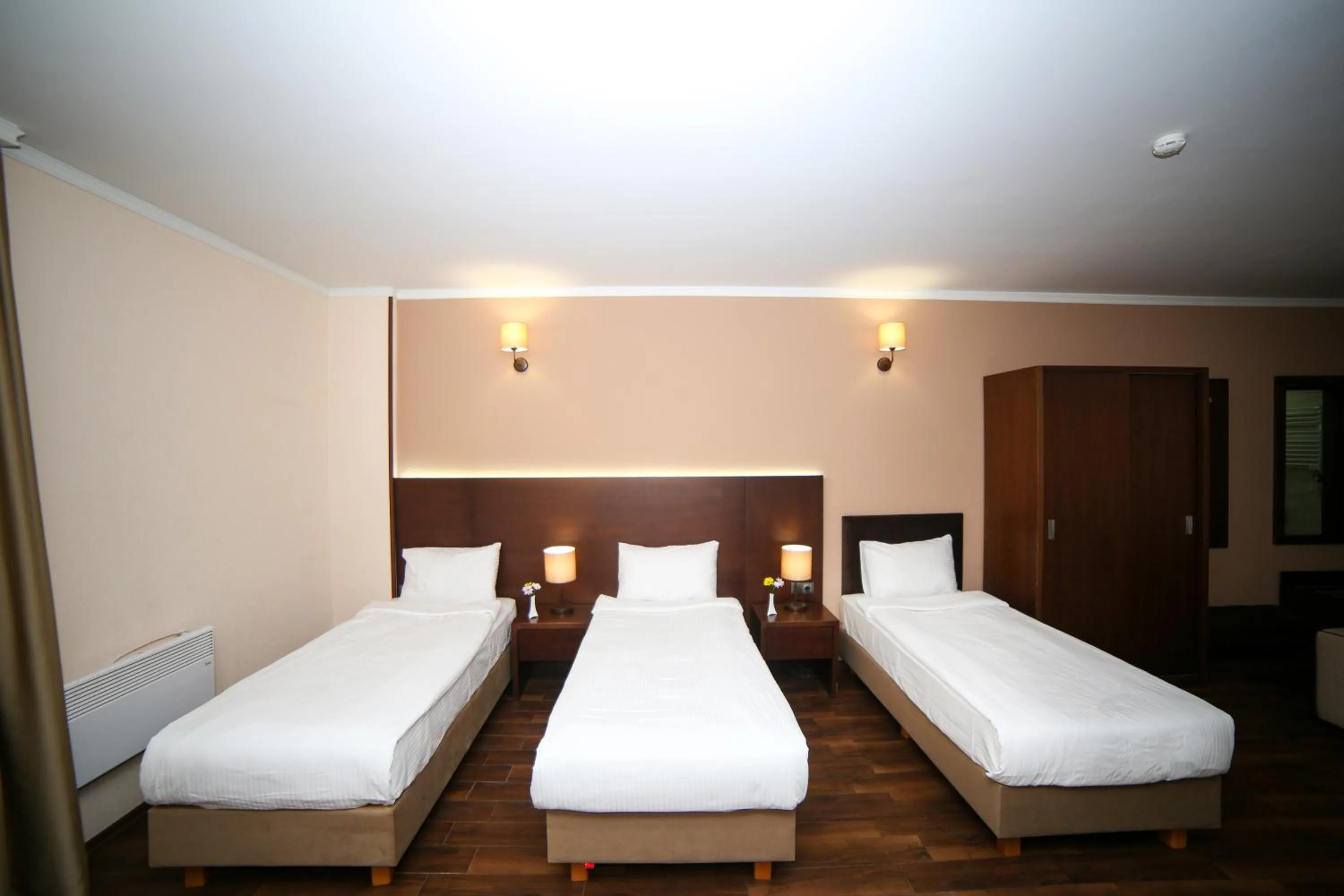 Bed in Hotel Corner Inn