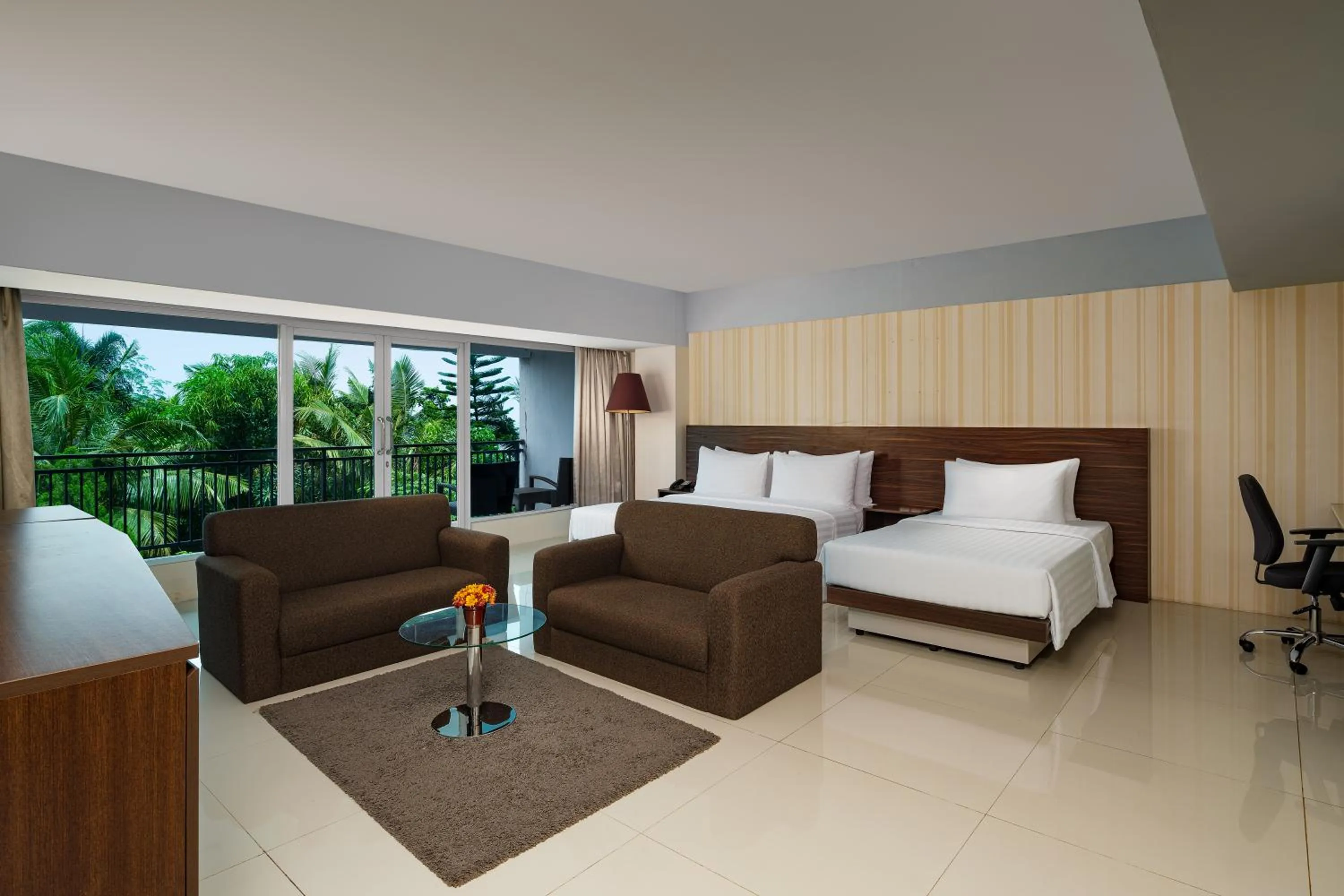Bed in Swiss-Belhotel Makassar