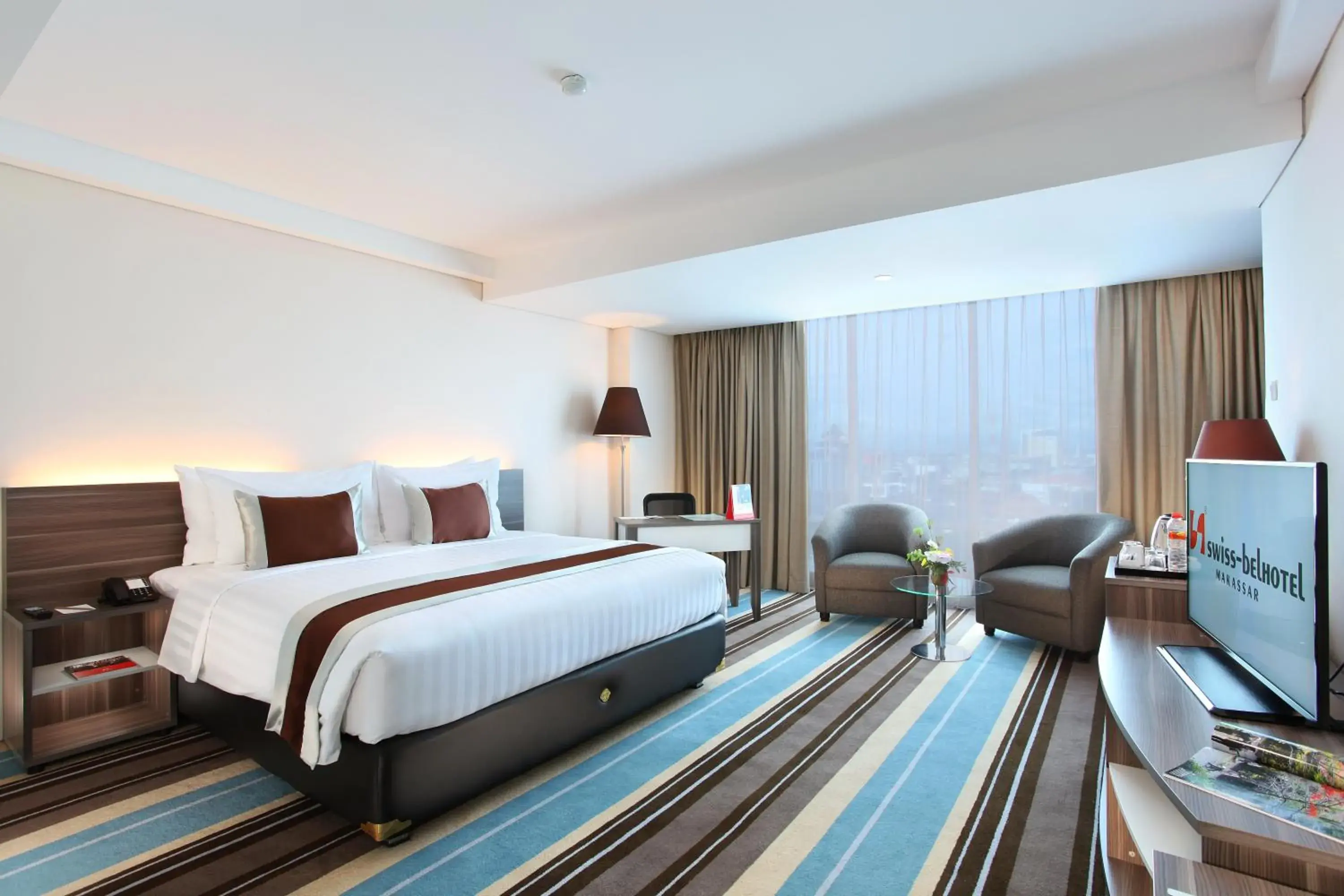 Grand Deluxe Double Room with City View in Swiss-Belhotel Makassar Grand Deluxe Double Room with City View in Swiss-Belhotel Makassar