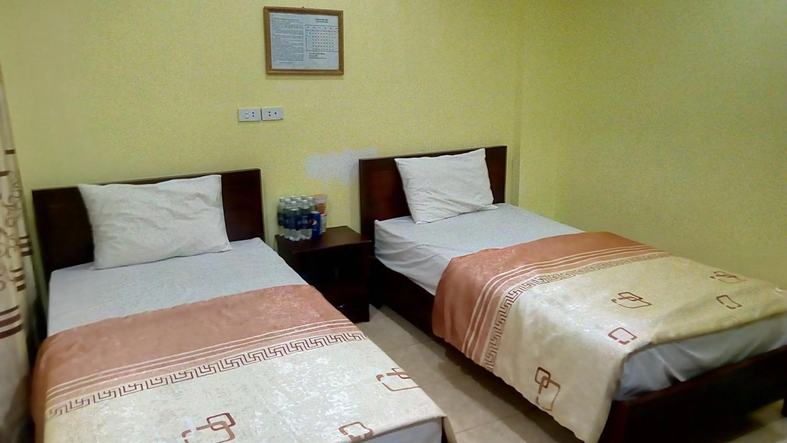 Bed in Hai Duong Hotel