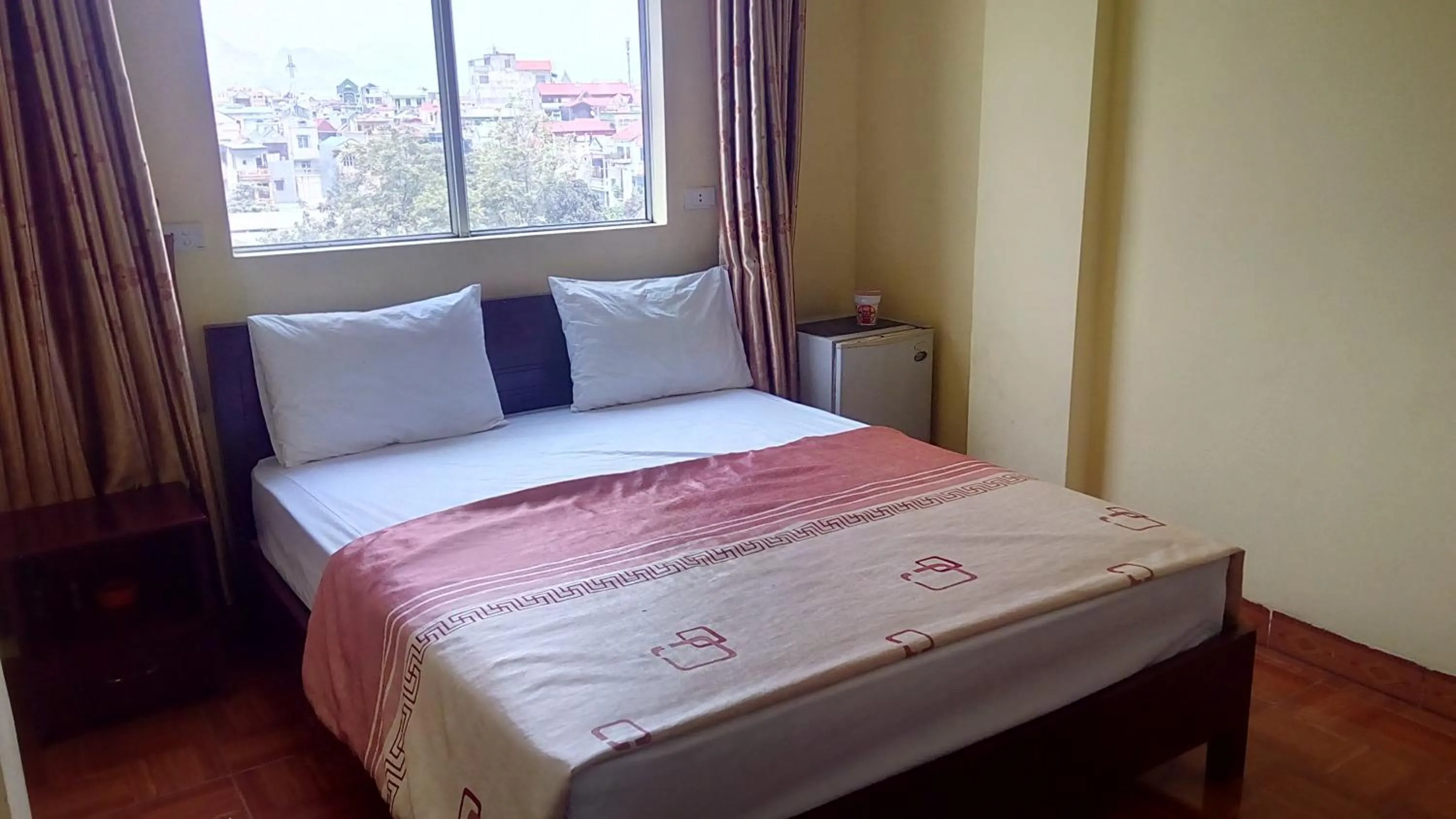 Bed in Hai Duong Hotel