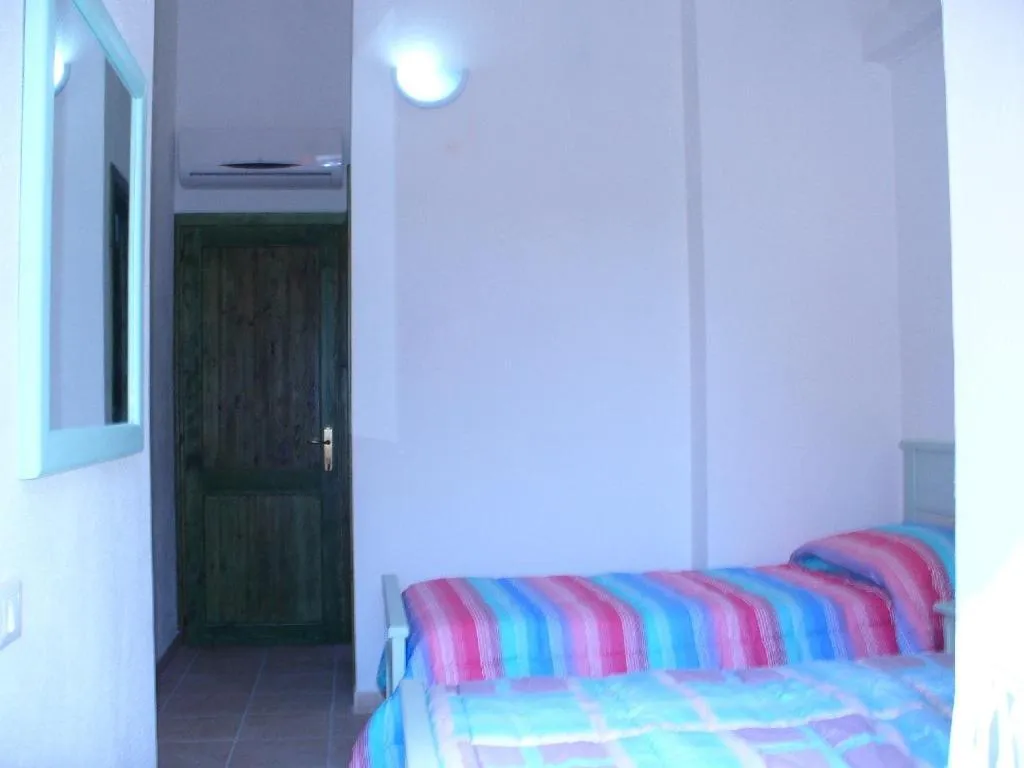 Photo of the whole room, Bed in L'Onda Blu