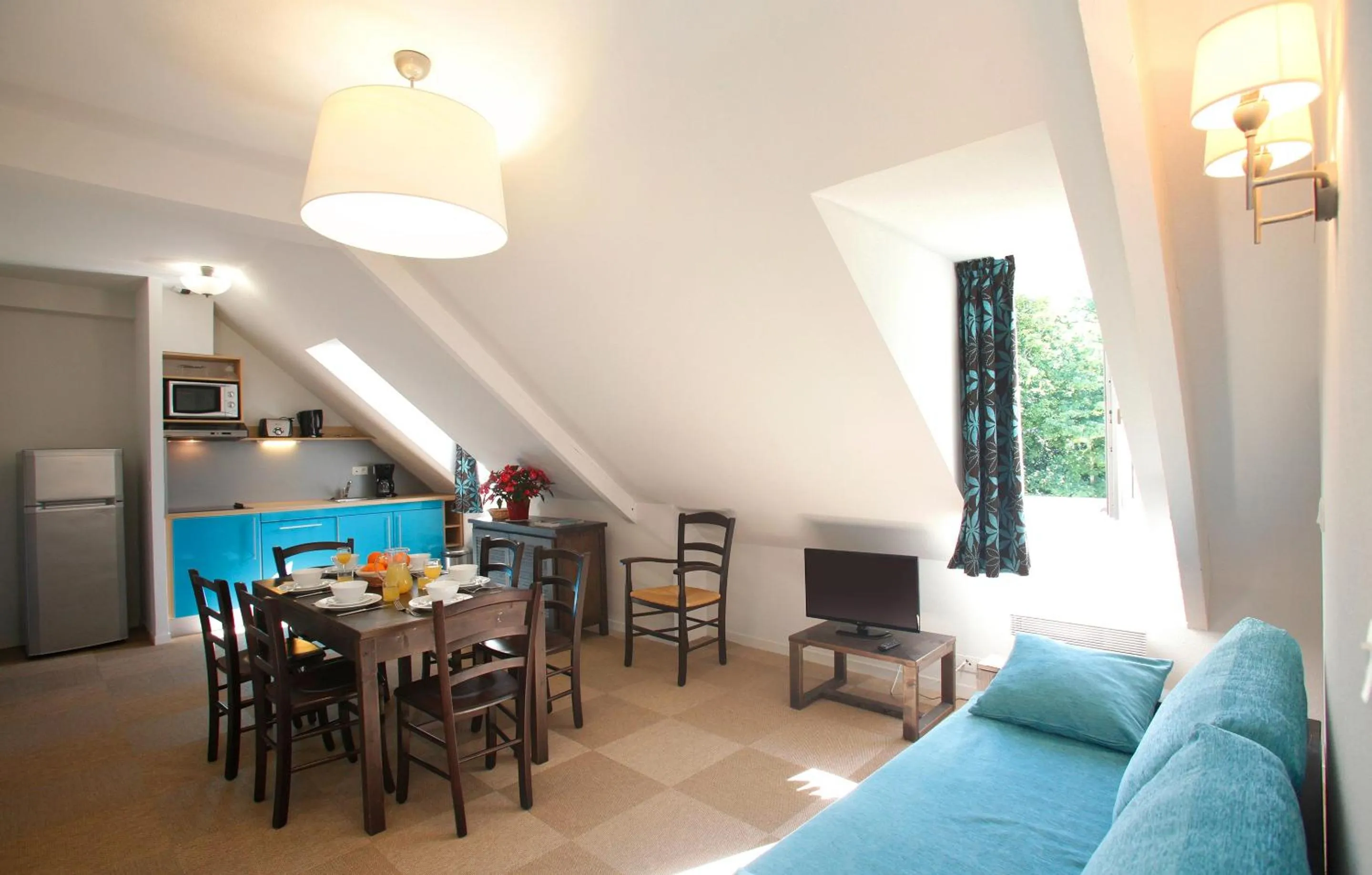 Kitchen or kitchenette in Résidence Odalys Le Château de Kéravéon