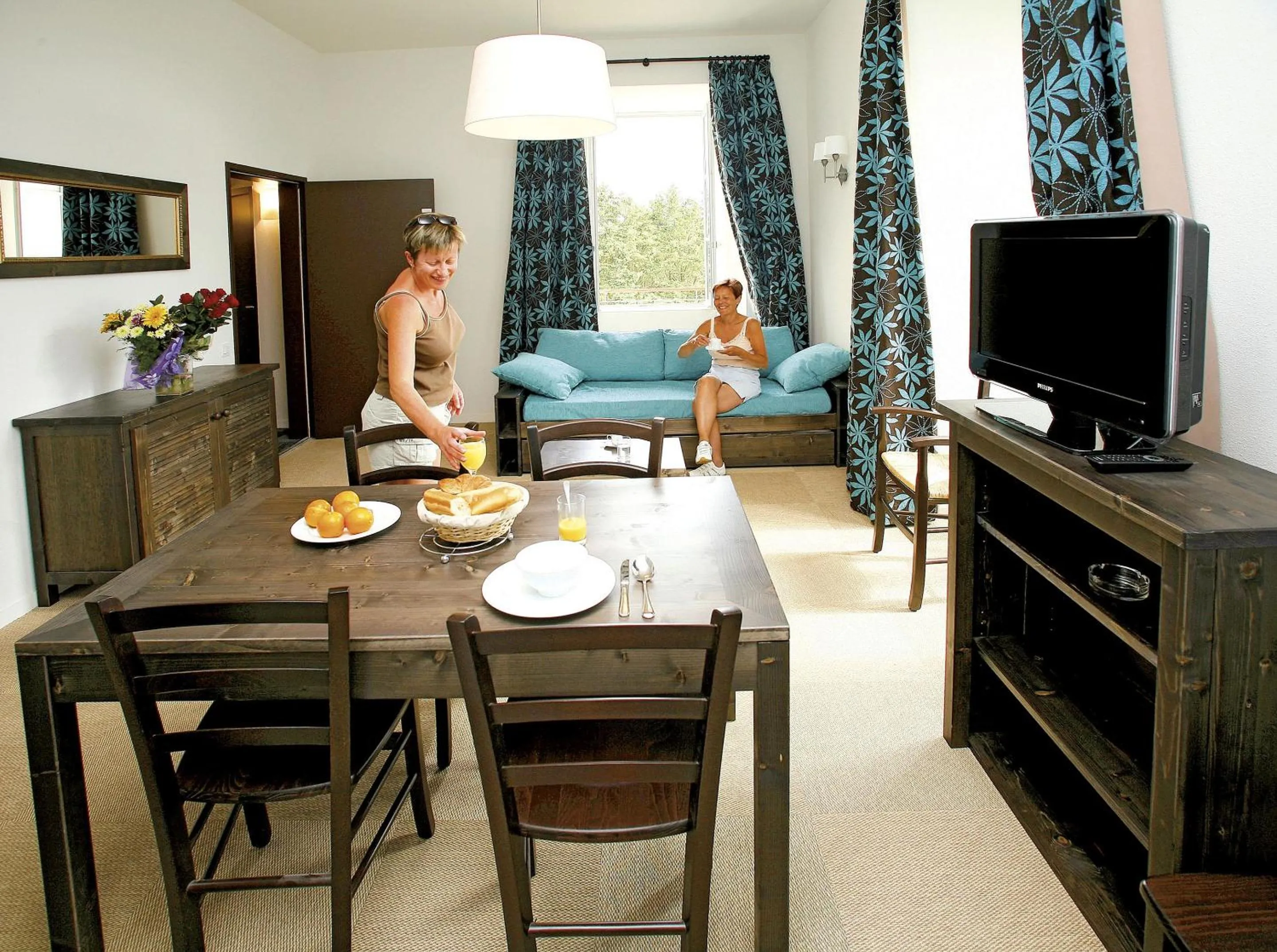 Living room in Résidence Odalys Le Château de Kéravéon