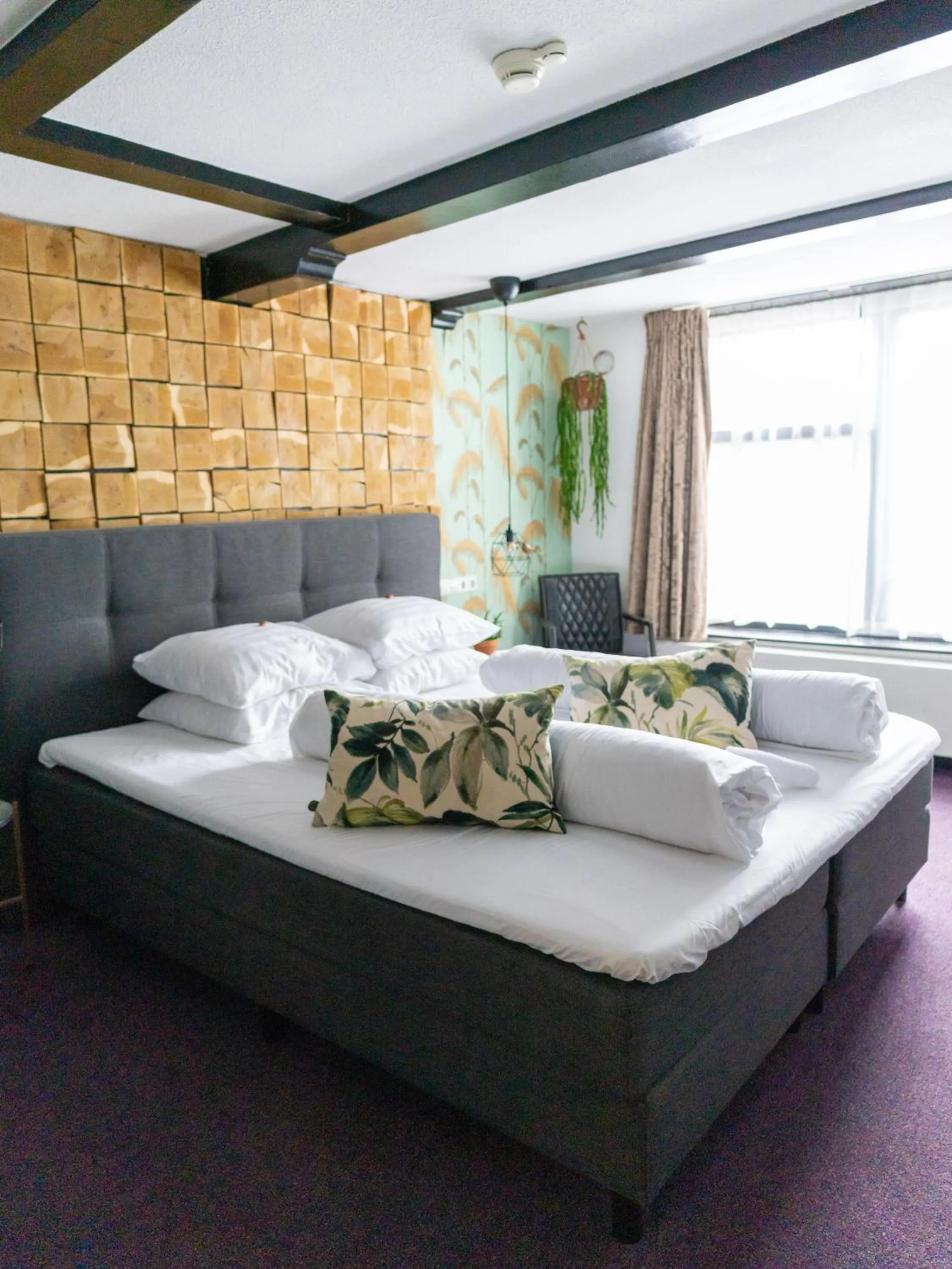 Bed in Wolf Hotel Kitchen & Bar