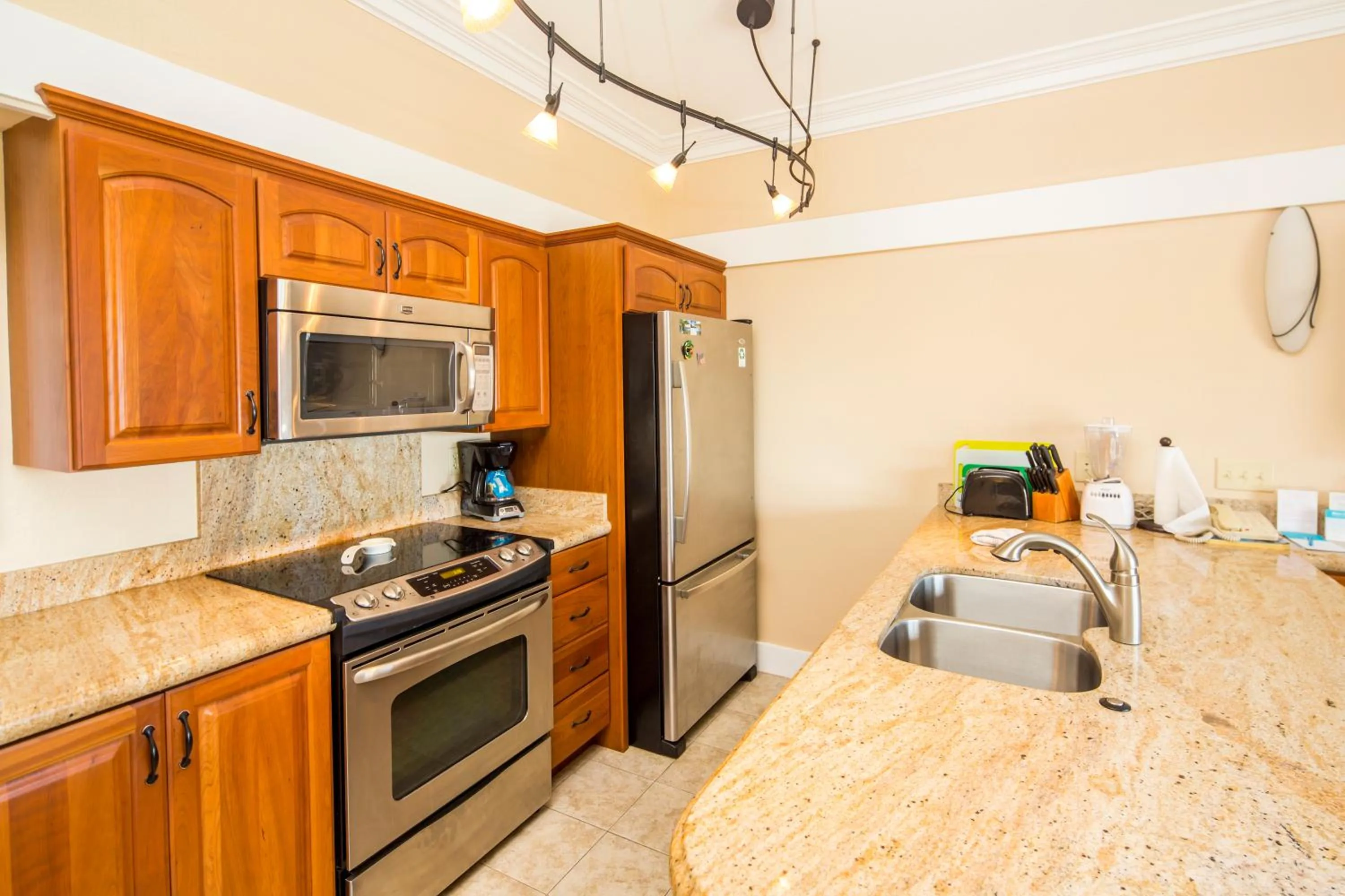 kitchen in Kiahuna Plantation and Beach Bungalows by Castle