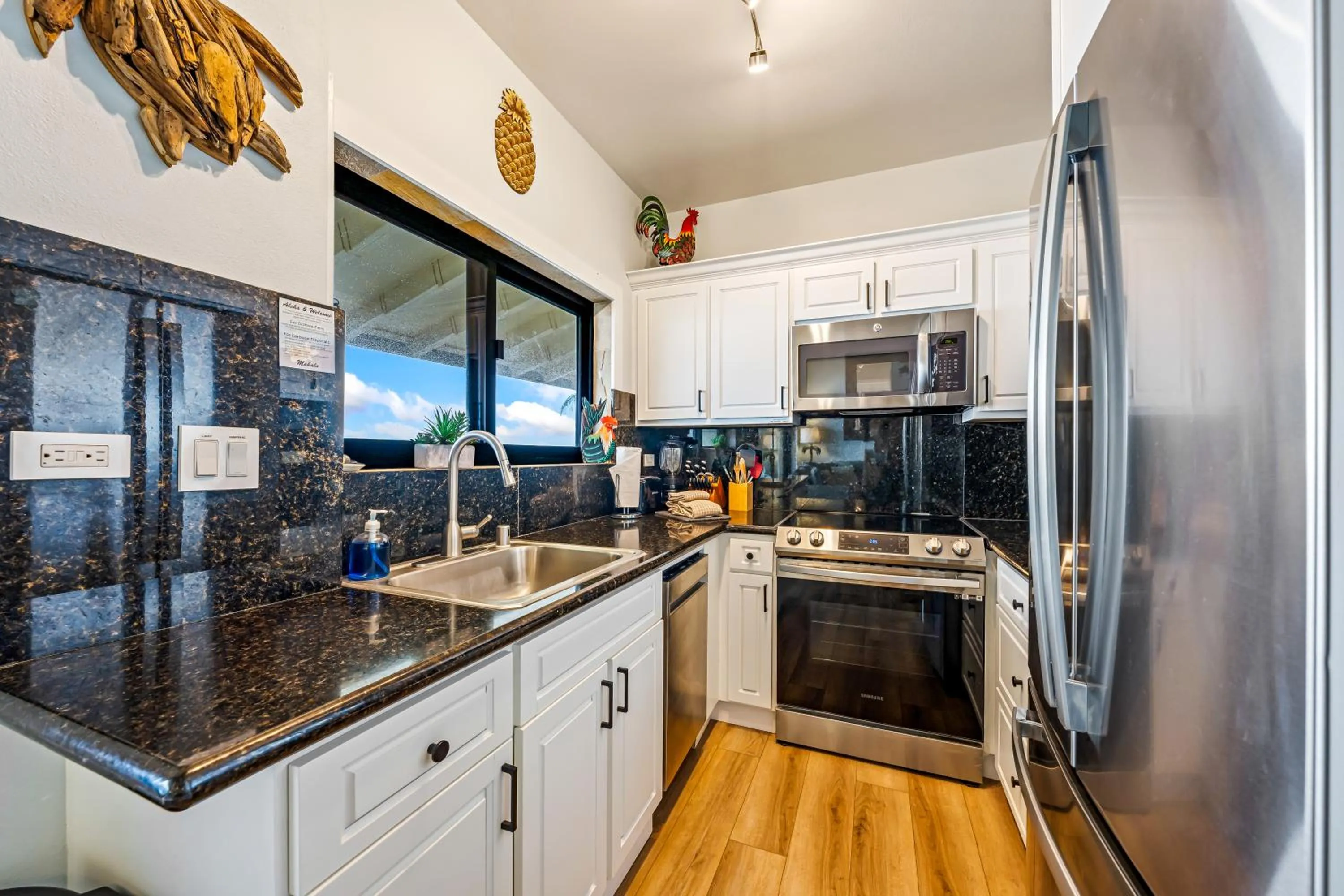 Kitchen or kitchenette in Castle Po'ipū Shores