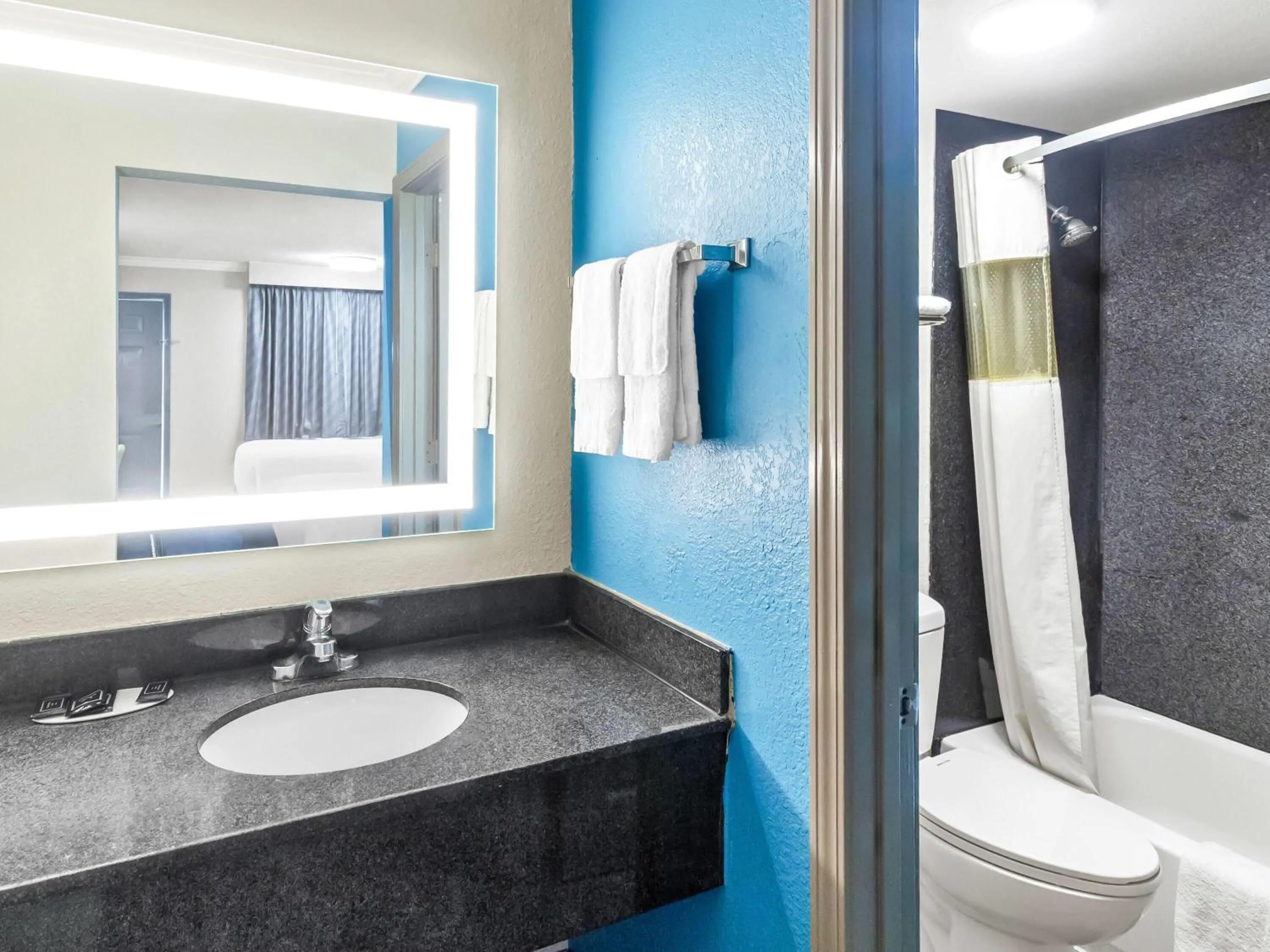 Bathroom in Days Inn by Wyndham Houston East