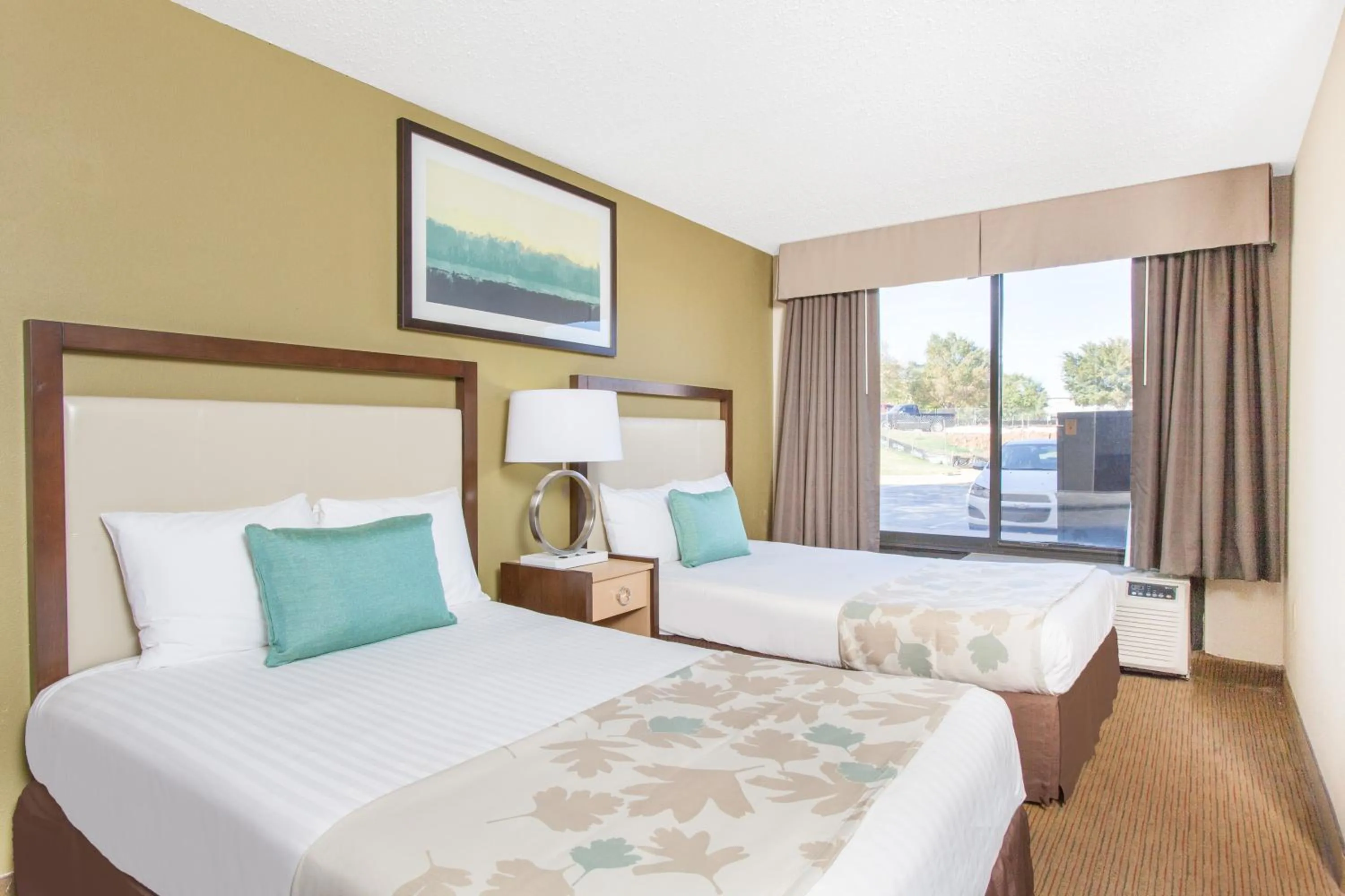 Bedroom, Bed in Hawthorn Suites Midwest City
