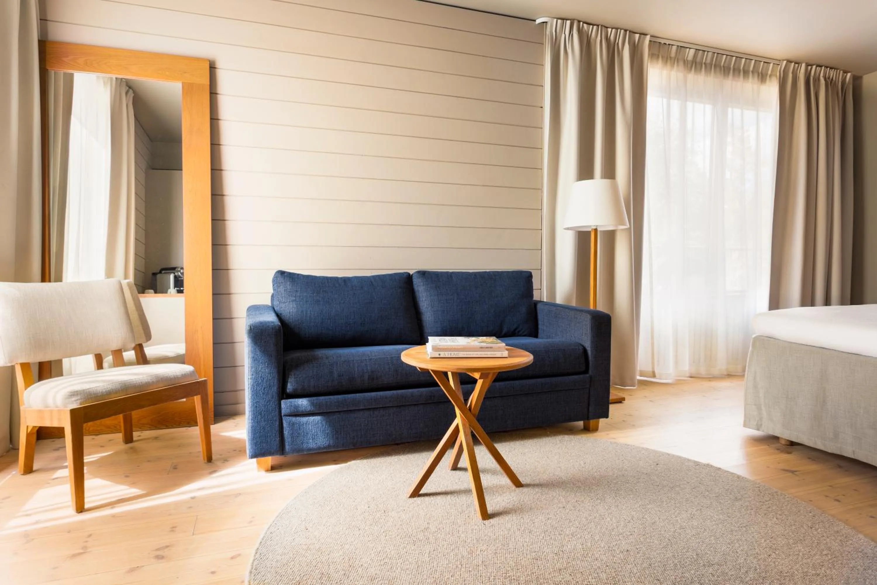 Living room, Bed in Hotel J, Stockholm, a Member of Design Hotels