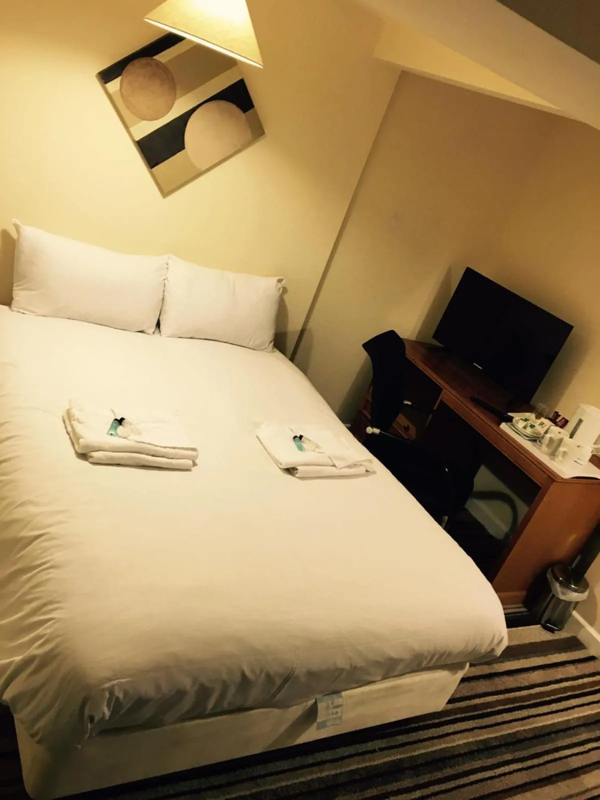 Bed in The Tudor House Hotel