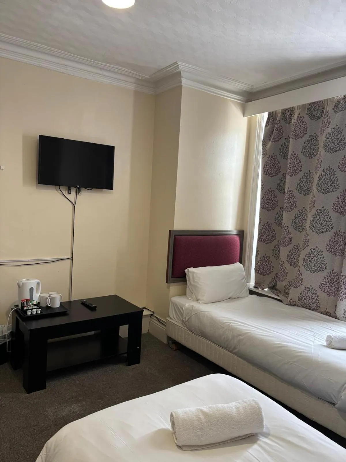 Bed in The Tudor House Hotel