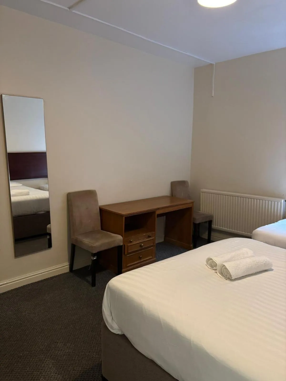 Bed in The Tudor House Hotel