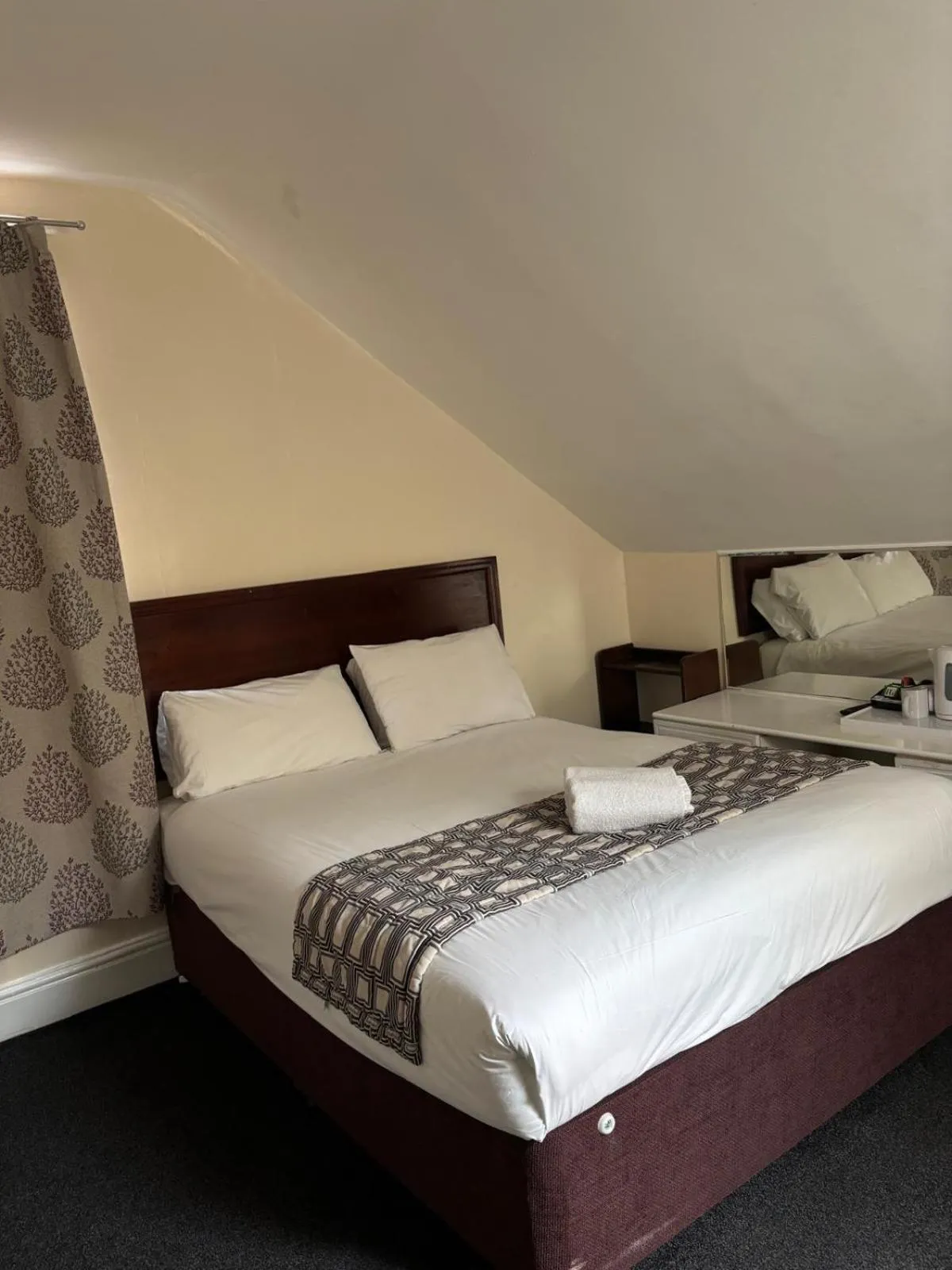 Bed in The Tudor House Hotel